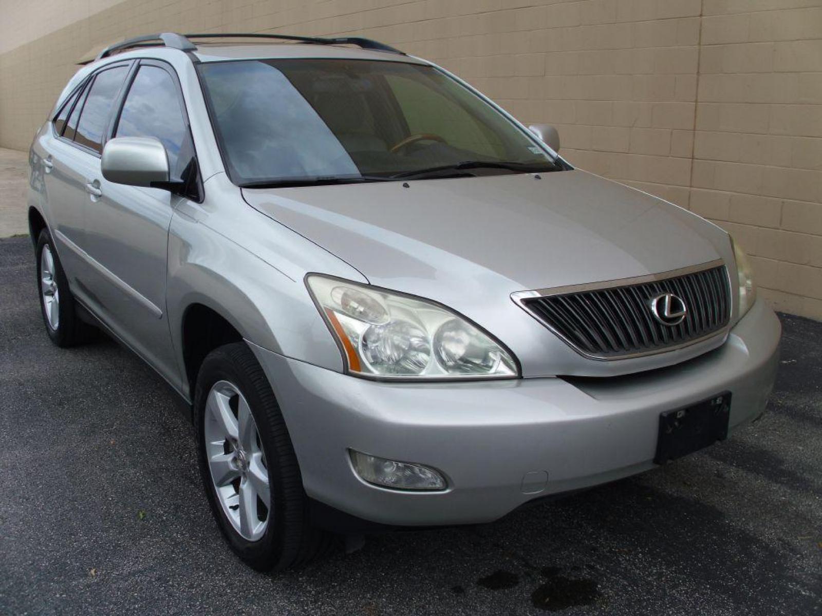 2004 SILVER LEXUS RX 330 (2T2GA31U34C) with an 3.3L engine, Automatic transmission, located at 12019 San Pedro Avenue, San Antonio, TX, 78216, (210) 494-5895, 29.551861, -98.487602 - Leather Seats; Memory Seats; Full Roof Rack; Air Conditioning; Power Windows; Power Locks; Power Steering; Available; AM/FM Cassette; AM/FM CD; Pass Key Security; Dual Front Airbags; Side Airbags; Active Seatbelts; Passenger Airbag Sensor; All Wheel ABS; Power Sun/Moon Roof - Photo #12