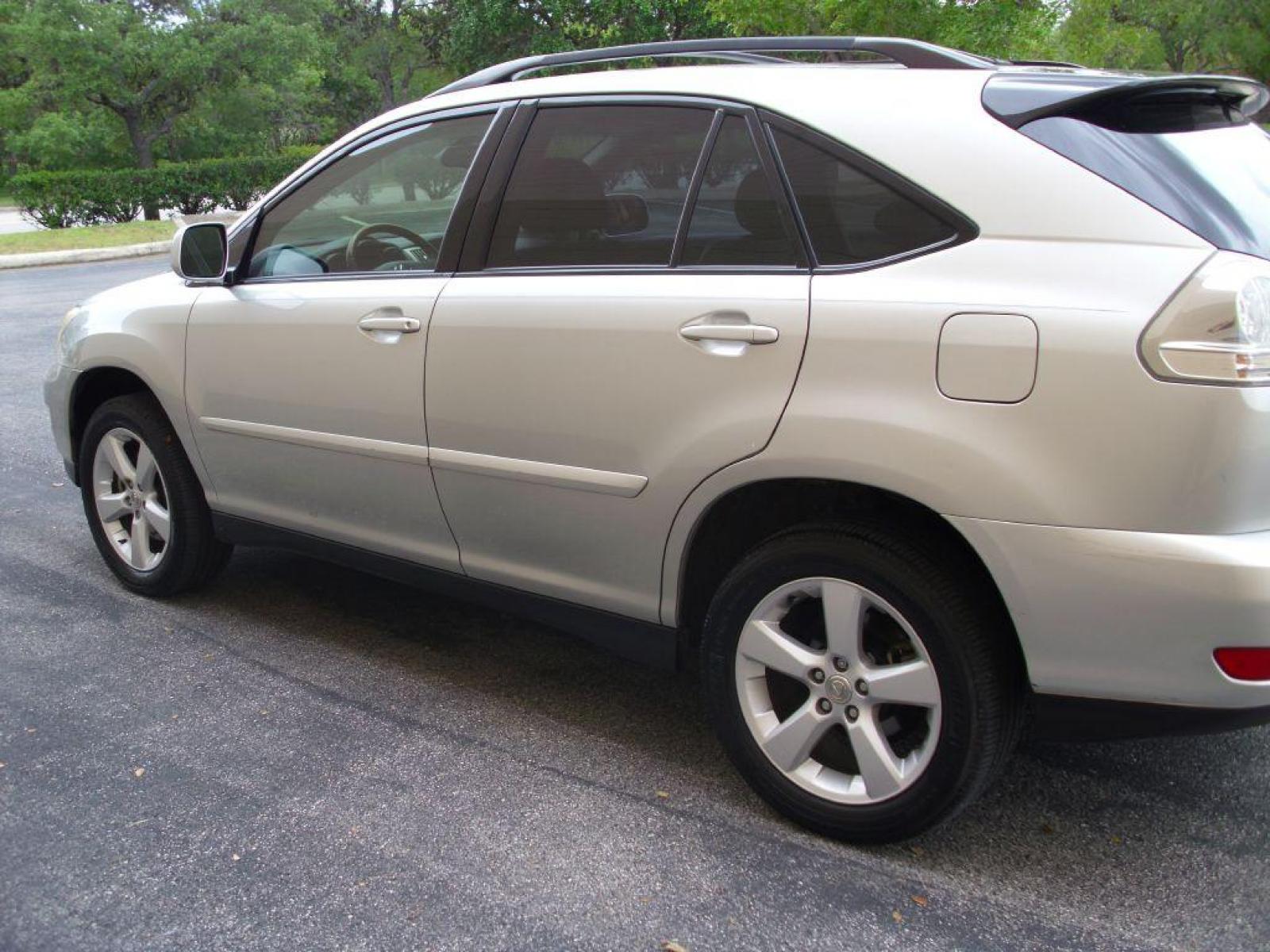 2004 SILVER LEXUS RX 330 (2T2GA31U34C) with an 3.3L engine, Automatic transmission, located at 12019 San Pedro Avenue, San Antonio, TX, 78216, (210) 494-5895, 29.551861, -98.487602 - Leather Seats; Memory Seats; Full Roof Rack; Air Conditioning; Power Windows; Power Locks; Power Steering; Available; AM/FM Cassette; AM/FM CD; Pass Key Security; Dual Front Airbags; Side Airbags; Active Seatbelts; Passenger Airbag Sensor; All Wheel ABS; Power Sun/Moon Roof - Photo #18