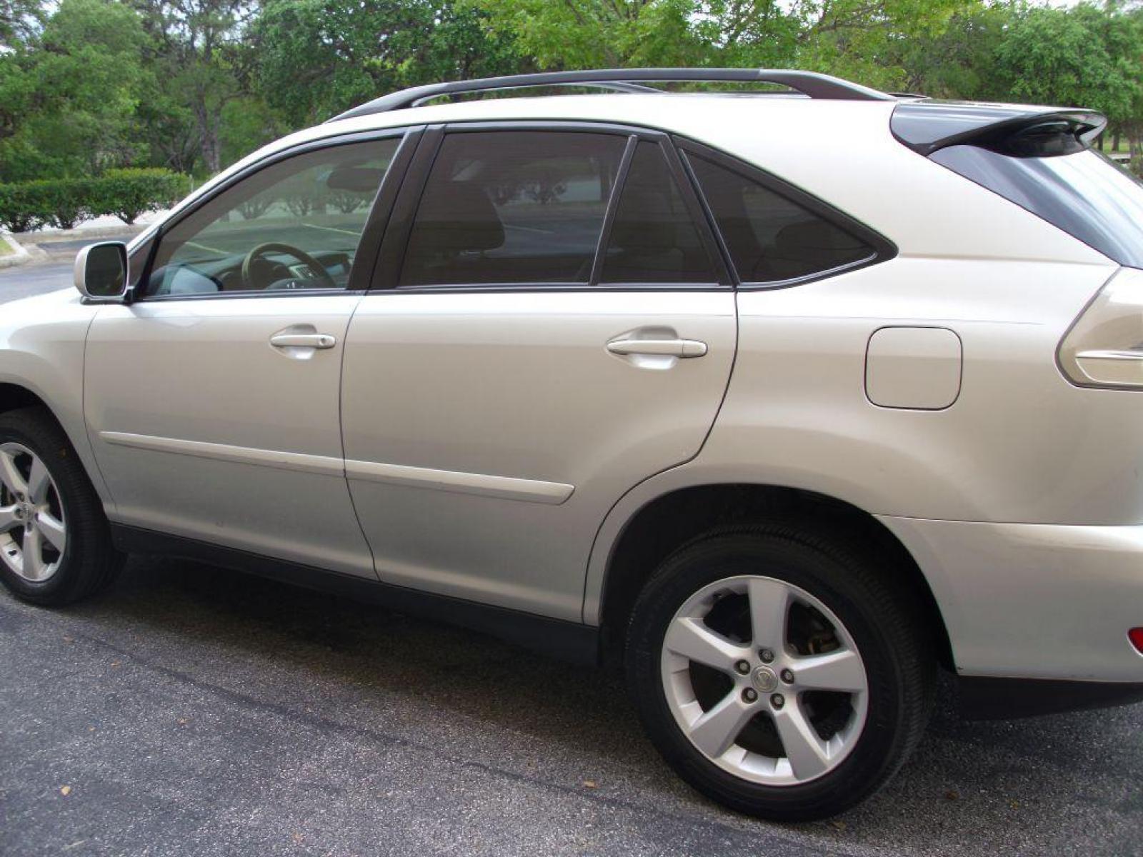 2004 SILVER LEXUS RX 330 (2T2GA31U34C) with an 3.3L engine, Automatic transmission, located at 12019 San Pedro Avenue, San Antonio, TX, 78216, (210) 494-5895, 29.551861, -98.487602 - Leather Seats; Memory Seats; Full Roof Rack; Air Conditioning; Power Windows; Power Locks; Power Steering; Available; AM/FM Cassette; AM/FM CD; Pass Key Security; Dual Front Airbags; Side Airbags; Active Seatbelts; Passenger Airbag Sensor; All Wheel ABS; Power Sun/Moon Roof - Photo #19