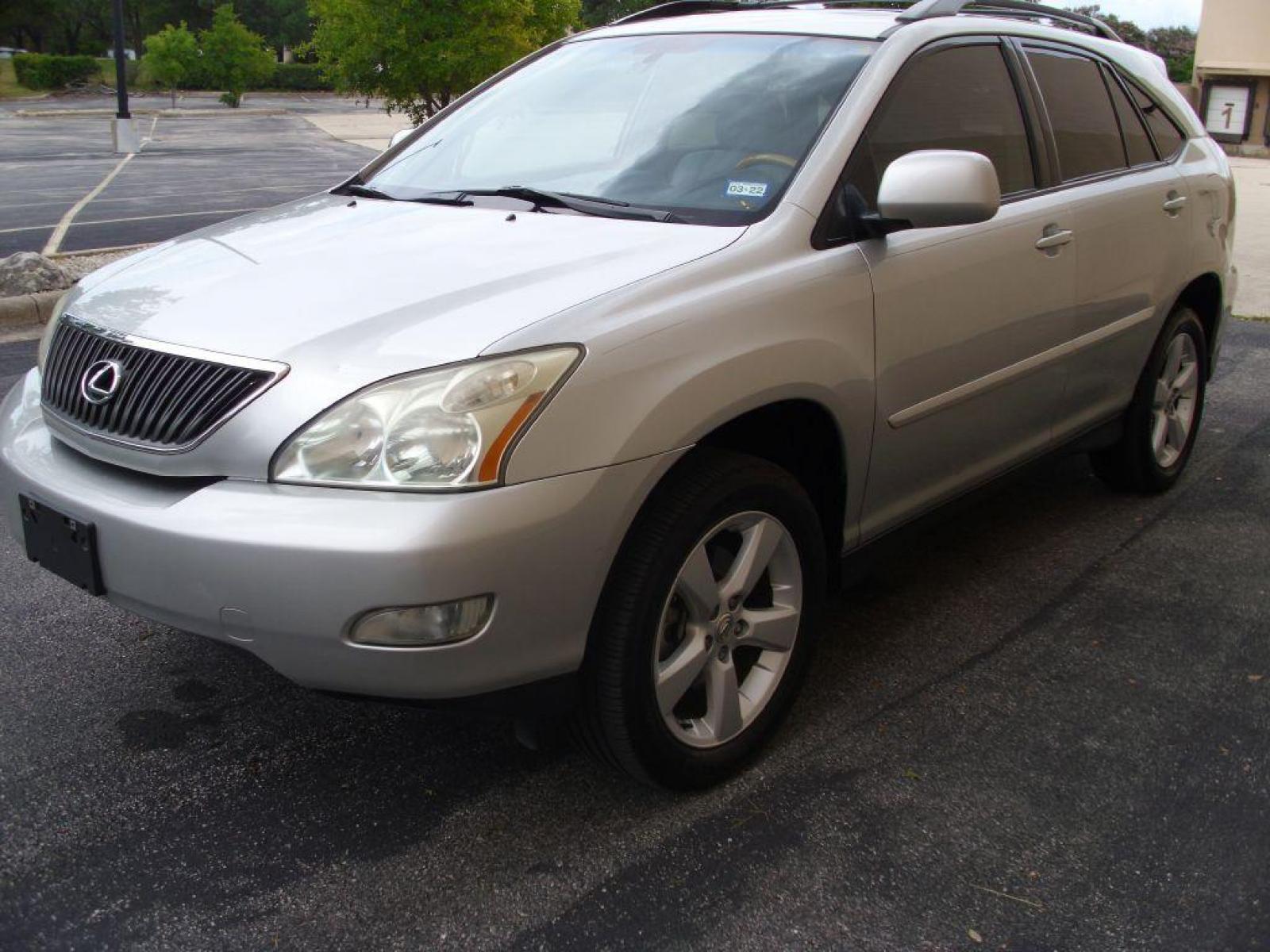 2004 SILVER LEXUS RX 330 (2T2GA31U34C) with an 3.3L engine, Automatic transmission, located at 12019 San Pedro Avenue, San Antonio, TX, 78216, (210) 494-5895, 29.551861, -98.487602 - Leather Seats; Memory Seats; Full Roof Rack; Air Conditioning; Power Windows; Power Locks; Power Steering; Available; AM/FM Cassette; AM/FM CD; Pass Key Security; Dual Front Airbags; Side Airbags; Active Seatbelts; Passenger Airbag Sensor; All Wheel ABS; Power Sun/Moon Roof - Photo #6