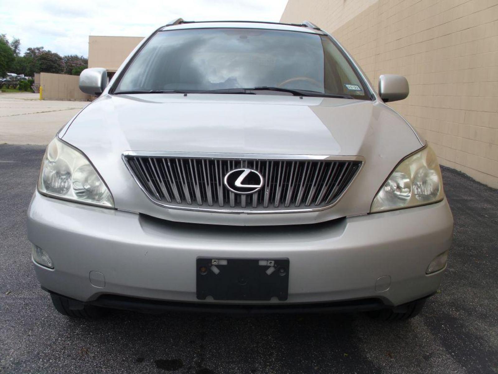 2004 SILVER LEXUS RX 330 (2T2GA31U34C) with an 3.3L engine, Automatic transmission, located at 12019 San Pedro Avenue, San Antonio, TX, 78216, (210) 494-5895, 29.551861, -98.487602 - Leather Seats; Memory Seats; Full Roof Rack; Air Conditioning; Power Windows; Power Locks; Power Steering; Available; AM/FM Cassette; AM/FM CD; Pass Key Security; Dual Front Airbags; Side Airbags; Active Seatbelts; Passenger Airbag Sensor; All Wheel ABS; Power Sun/Moon Roof - Photo #3
