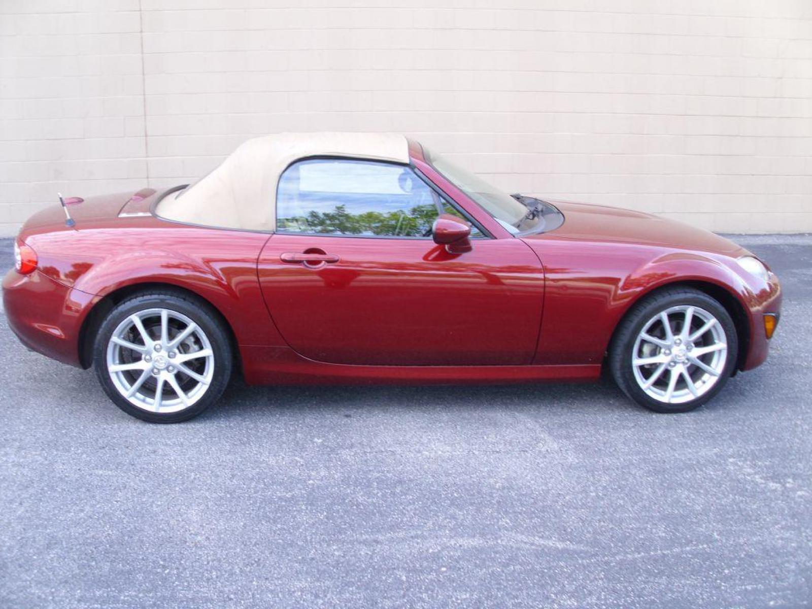 2009 RED MAZDA MX-5 MIATA GRAND TOURING (JM1NC25F390) with an 2.0L engine, Automatic transmission, located at 12019 San Pedro Avenue, San Antonio, TX, 78216, (210) 494-5895, 29.551861, -98.487602 - Cruise Control; Front Seat Heaters; Leather Seats; Soft Top; Air Conditioning; Power Windows; Power Locks; Power Steering; Tilt Wheel; AM/FM CD/MP3; Satellite; Passive engine immobilizer; Dual Front Airbags; Side Airbags; Active Seatbelts; Passenger Airbag Sensor; All Wheel ABS; Retractable Roof Pan - Photo #0