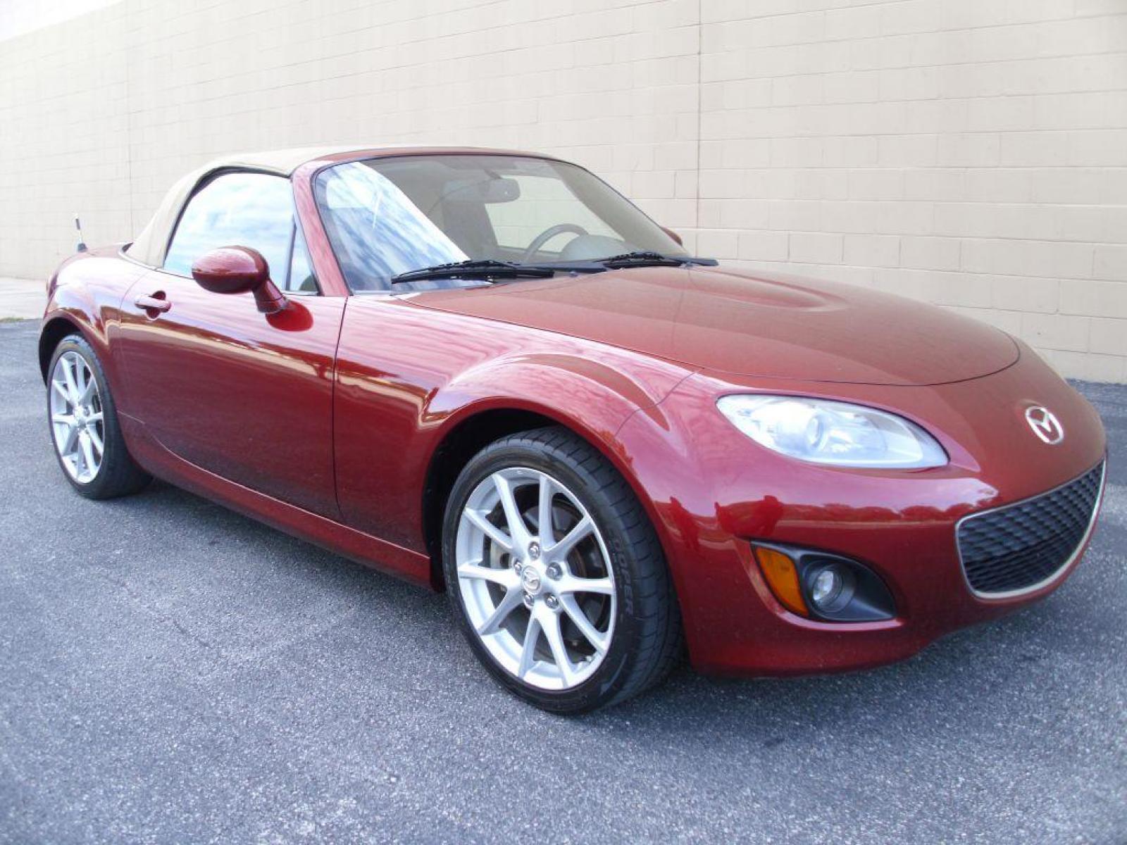 2009 RED MAZDA MX-5 MIATA GRAND TOURING (JM1NC25F390) with an 2.0L engine, Automatic transmission, located at 12019 San Pedro Avenue, San Antonio, TX, 78216, (210) 494-5895, 29.551861, -98.487602 - Cruise Control; Front Seat Heaters; Leather Seats; Soft Top; Air Conditioning; Power Windows; Power Locks; Power Steering; Tilt Wheel; AM/FM CD/MP3; Satellite; Passive engine immobilizer; Dual Front Airbags; Side Airbags; Active Seatbelts; Passenger Airbag Sensor; All Wheel ABS; Retractable Roof Pan - Photo #9