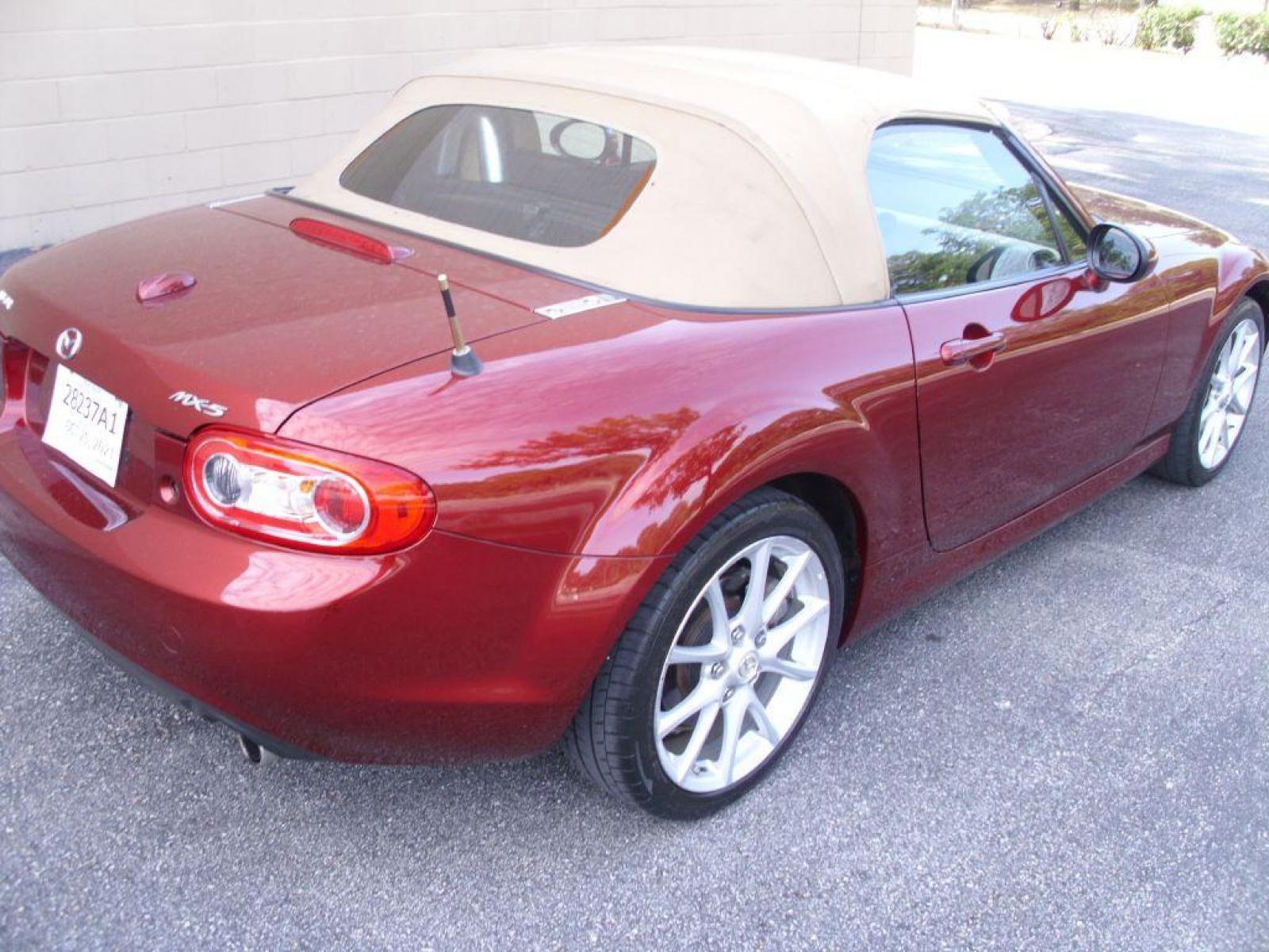 2009 RED MAZDA MX-5 MIATA GRAND TOURING (JM1NC25F390) with an 2.0L engine, Automatic transmission, located at 12019 San Pedro Avenue, San Antonio, TX, 78216, (210) 494-5895, 29.551861, -98.487602 - Cruise Control; Front Seat Heaters; Leather Seats; Soft Top; Air Conditioning; Power Windows; Power Locks; Power Steering; Tilt Wheel; AM/FM CD/MP3; Satellite; Passive engine immobilizer; Dual Front Airbags; Side Airbags; Active Seatbelts; Passenger Airbag Sensor; All Wheel ABS; Retractable Roof Pan - Photo #13