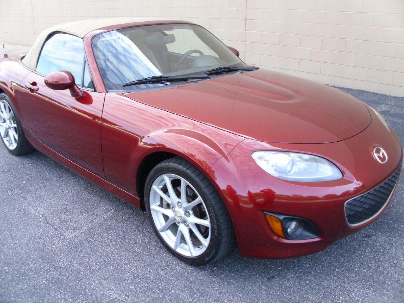 2009 RED MAZDA MX-5 MIATA GRAND TOURING (JM1NC25F390) with an 2.0L engine, Automatic transmission, located at 12019 San Pedro Avenue, San Antonio, TX, 78216, (210) 494-5895, 29.551861, -98.487602 - Cruise Control; Front Seat Heaters; Leather Seats; Soft Top; Air Conditioning; Power Windows; Power Locks; Power Steering; Tilt Wheel; AM/FM CD/MP3; Satellite; Passive engine immobilizer; Dual Front Airbags; Side Airbags; Active Seatbelts; Passenger Airbag Sensor; All Wheel ABS; Retractable Roof Pan - Photo #1