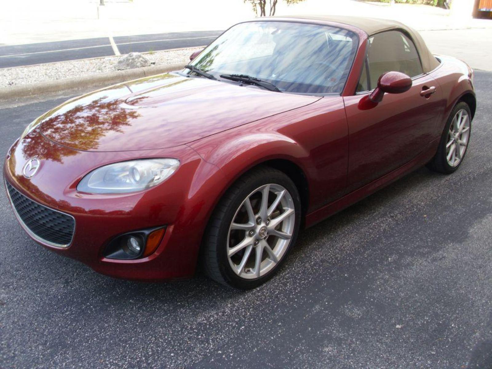 2009 RED MAZDA MX-5 MIATA GRAND TOURING (JM1NC25F390) with an 2.0L engine, Automatic transmission, located at 12019 San Pedro Avenue, San Antonio, TX, 78216, (210) 494-5895, 29.551861, -98.487602 - Cruise Control; Front Seat Heaters; Leather Seats; Soft Top; Air Conditioning; Power Windows; Power Locks; Power Steering; Tilt Wheel; AM/FM CD/MP3; Satellite; Passive engine immobilizer; Dual Front Airbags; Side Airbags; Active Seatbelts; Passenger Airbag Sensor; All Wheel ABS; Retractable Roof Pan - Photo #3