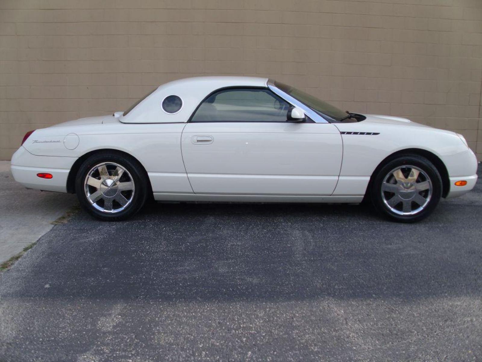 2002 WHITE FORD THUNDERBIRD (1FAHP60A02Y) with an 3.9L engine, Automatic transmission, located at 12019 San Pedro Avenue, San Antonio, TX, 78216, (210) 494-5895, 29.551861, -98.487602 - ONE OWNER; Leather Seats; Hard Top and Soft Top; Air Conditioning; Power Windows; Power Locks; Power Steering; Tilt Wheel; AM/FM CD; Pass Key Security; Dual Front Airbags; Sid Ar Bgs; Passenger deactivation switch; All Wheel ABS - Photo #17