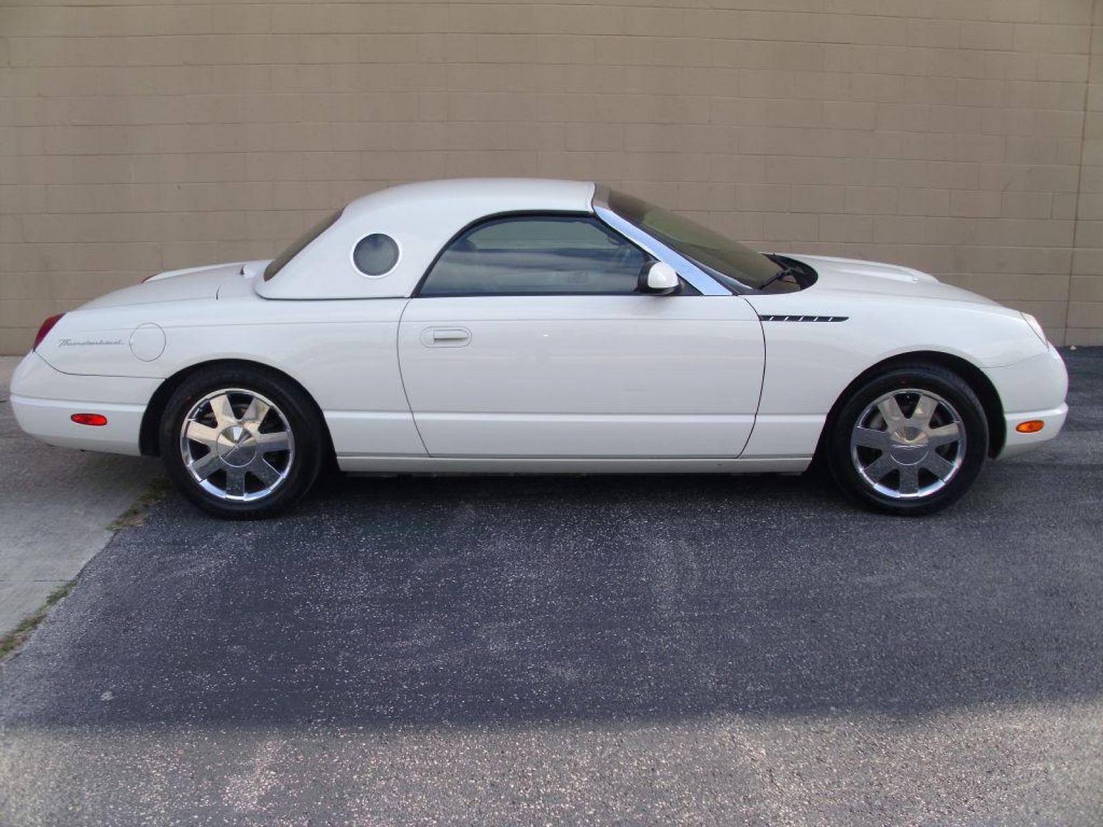2002 WHITE FORD THUNDERBIRD (1FAHP60A02Y) with an 3.9L engine, Automatic transmission, located at 12019 San Pedro Avenue, San Antonio, TX, 78216, (210) 494-5895, 29.551861, -98.487602 - ONE OWNER; Leather Seats; Hard Top and Soft Top; Air Conditioning; Power Windows; Power Locks; Power Steering; Tilt Wheel; AM/FM CD; Pass Key Security; Dual Front Airbags; Sid Ar Bgs; Passenger deactivation switch; All Wheel ABS - Photo #18