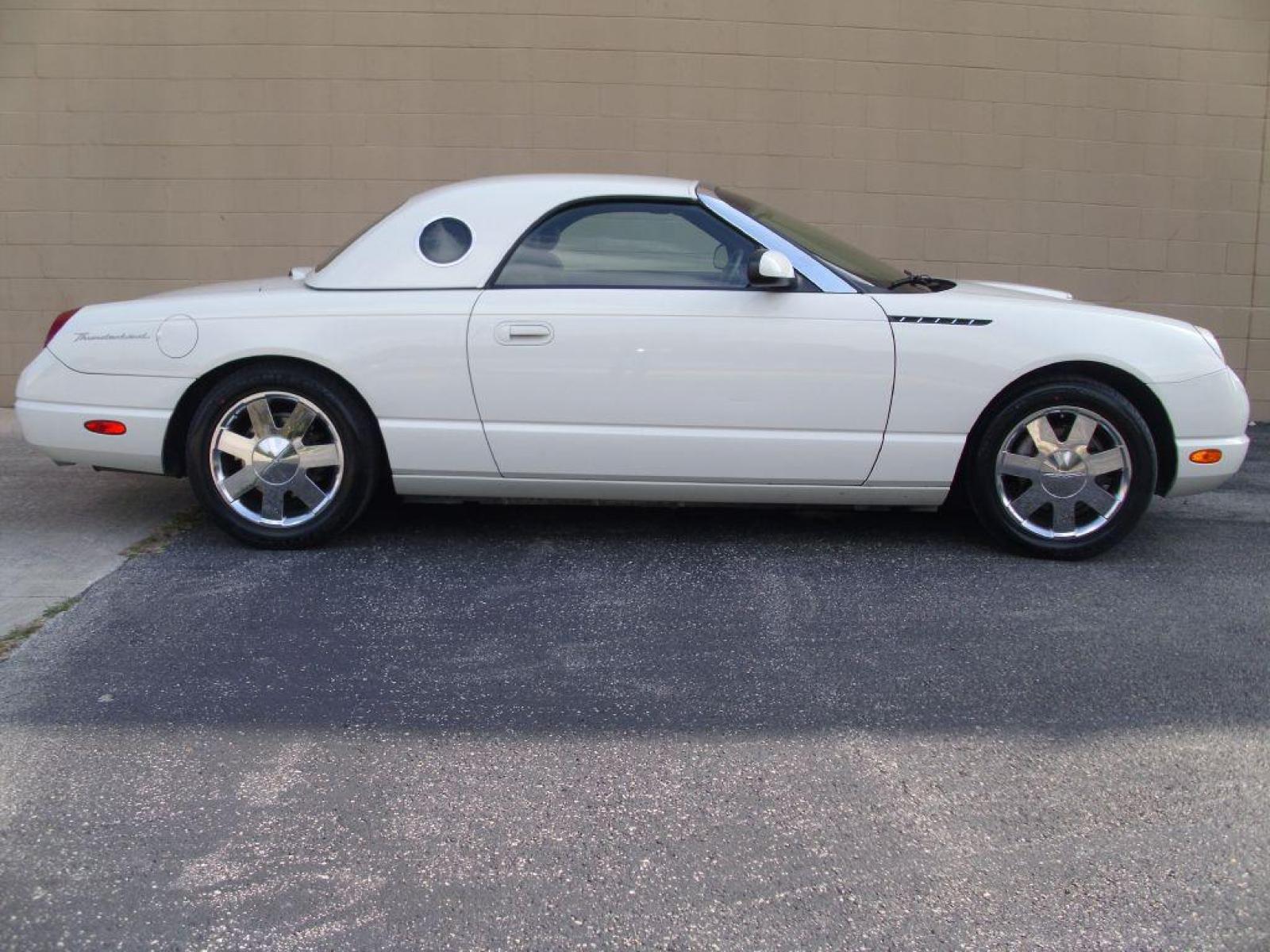 2002 WHITE FORD THUNDERBIRD (1FAHP60A02Y) with an 3.9L engine, Automatic transmission, located at 12019 San Pedro Avenue, San Antonio, TX, 78216, (210) 494-5895, 29.551861, -98.487602 - ONE OWNER; Leather Seats; Hard Top and Soft Top; Air Conditioning; Power Windows; Power Locks; Power Steering; Tilt Wheel; AM/FM CD; Pass Key Security; Dual Front Airbags; Sid Ar Bgs; Passenger deactivation switch; All Wheel ABS - Photo #19