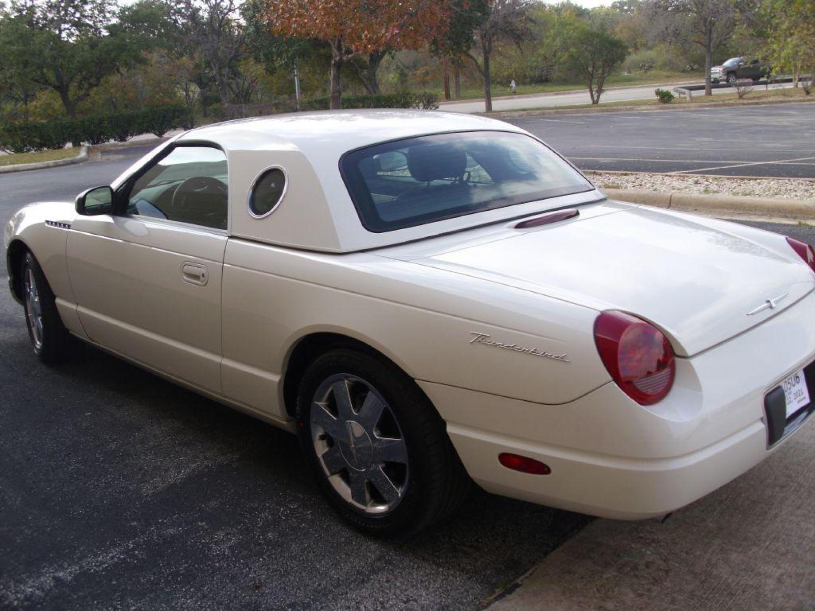 2002 WHITE FORD THUNDERBIRD (1FAHP60A02Y) with an 3.9L engine, Automatic transmission, located at 12019 San Pedro Avenue, San Antonio, TX, 78216, (210) 494-5895, 29.551861, -98.487602 - ONE OWNER; Leather Seats; Hard Top and Soft Top; Air Conditioning; Power Windows; Power Locks; Power Steering; Tilt Wheel; AM/FM CD; Pass Key Security; Dual Front Airbags; Sid Ar Bgs; Passenger deactivation switch; All Wheel ABS - Photo #26