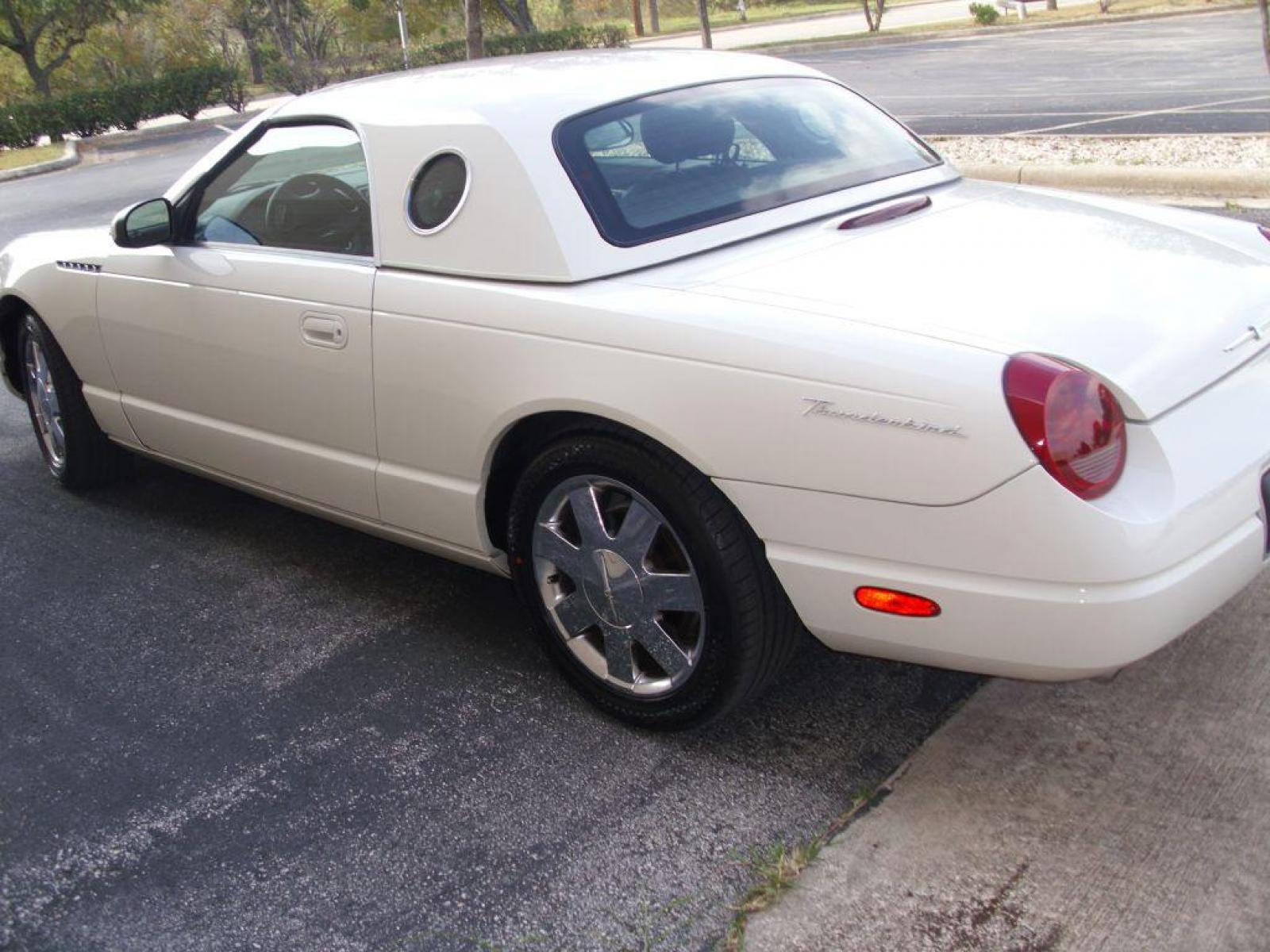 2002 WHITE FORD THUNDERBIRD (1FAHP60A02Y) with an 3.9L engine, Automatic transmission, located at 12019 San Pedro Avenue, San Antonio, TX, 78216, (210) 494-5895, 29.551861, -98.487602 - ONE OWNER; Leather Seats; Hard Top and Soft Top; Air Conditioning; Power Windows; Power Locks; Power Steering; Tilt Wheel; AM/FM CD; Pass Key Security; Dual Front Airbags; Sid Ar Bgs; Passenger deactivation switch; All Wheel ABS - Photo #27