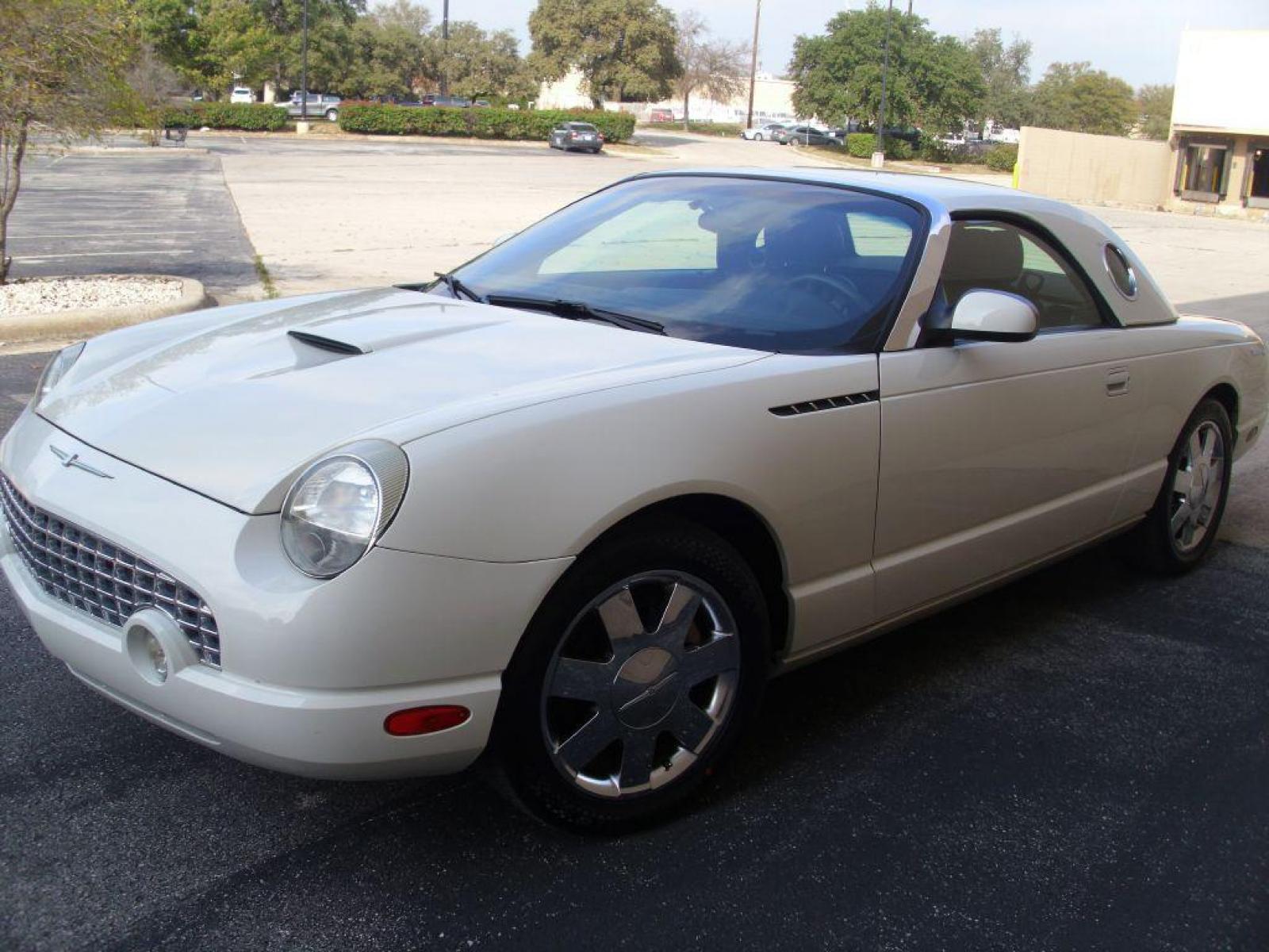 2002 WHITE FORD THUNDERBIRD (1FAHP60A02Y) with an 3.9L engine, Automatic transmission, located at 12019 San Pedro Avenue, San Antonio, TX, 78216, (210) 494-5895, 29.551861, -98.487602 - ONE OWNER; Leather Seats; Hard Top and Soft Top; Air Conditioning; Power Windows; Power Locks; Power Steering; Tilt Wheel; AM/FM CD; Pass Key Security; Dual Front Airbags; Sid Ar Bgs; Passenger deactivation switch; All Wheel ABS - Photo #2