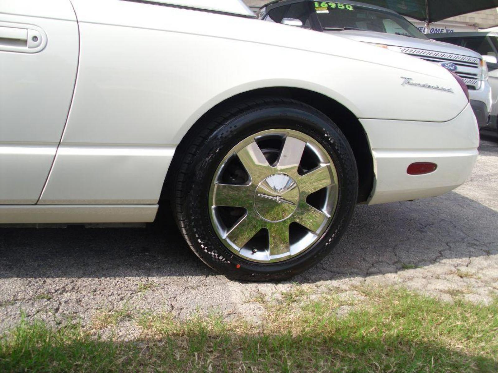 2002 WHITE FORD THUNDERBIRD (1FAHP60A02Y) with an 3.9L engine, Automatic transmission, located at 12019 San Pedro Avenue, San Antonio, TX, 78216, (210) 494-5895, 29.551861, -98.487602 - ONE OWNER; Leather Seats; Hard Top and Soft Top; Air Conditioning; Power Windows; Power Locks; Power Steering; Tilt Wheel; AM/FM CD; Pass Key Security; Dual Front Airbags; Sid Ar Bgs; Passenger deactivation switch; All Wheel ABS - Photo #49
