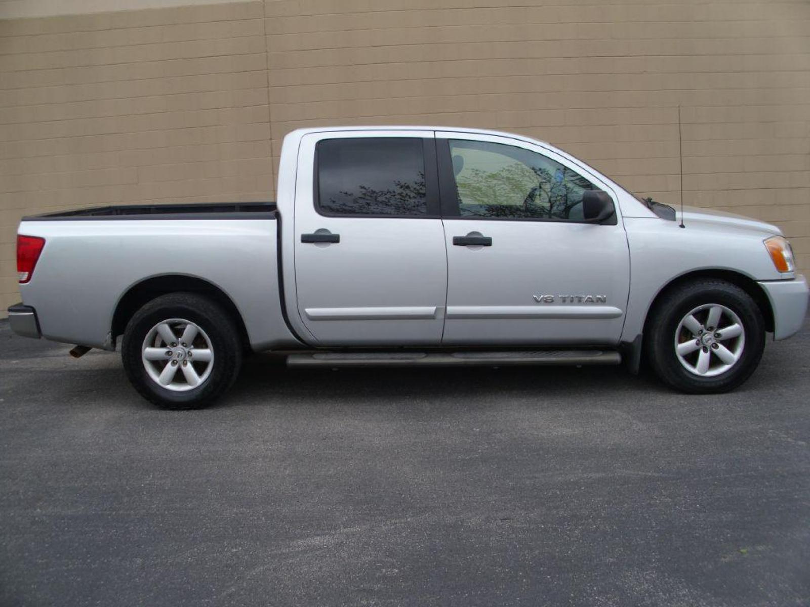 2013 SILVER NISSAN TITAN S (1N6BA0ED2DN) with an 5.6L engine, Automatic transmission, located at 12019 San Pedro Avenue, San Antonio, TX, 78216, (210) 494-5895, 29.551861, -98.487602 - 4 Door; Bed Liner; Bluetooth Technology; Backup Camera; Running Boards; Towing Package; Air Conditioning; Power Windows; Power Locks; Power Steering; Tilt Wheel; AM/FM CD; AM/FM CD/MP3; Satellite; Dual Front Airbags; Passenger Sensor; Active Belts; Crew Cab; Regular Bed; All Wheel ABS; 1/2 Ton; Back - Photo #1