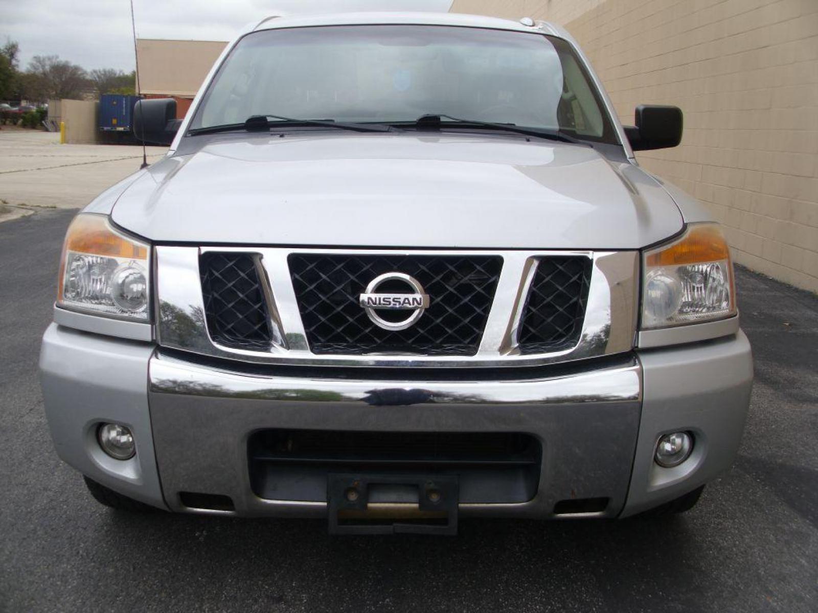 2013 SILVER NISSAN TITAN S (1N6BA0ED2DN) with an 5.6L engine, Automatic transmission, located at 12019 San Pedro Avenue, San Antonio, TX, 78216, (210) 494-5895, 29.551861, -98.487602 - 4 Door; Bed Liner; Bluetooth Technology; Backup Camera; Running Boards; Towing Package; Air Conditioning; Power Windows; Power Locks; Power Steering; Tilt Wheel; AM/FM CD; AM/FM CD/MP3; Satellite; Dual Front Airbags; Passenger Sensor; Active Belts; Crew Cab; Regular Bed; All Wheel ABS; 1/2 Ton; Back - Photo #5