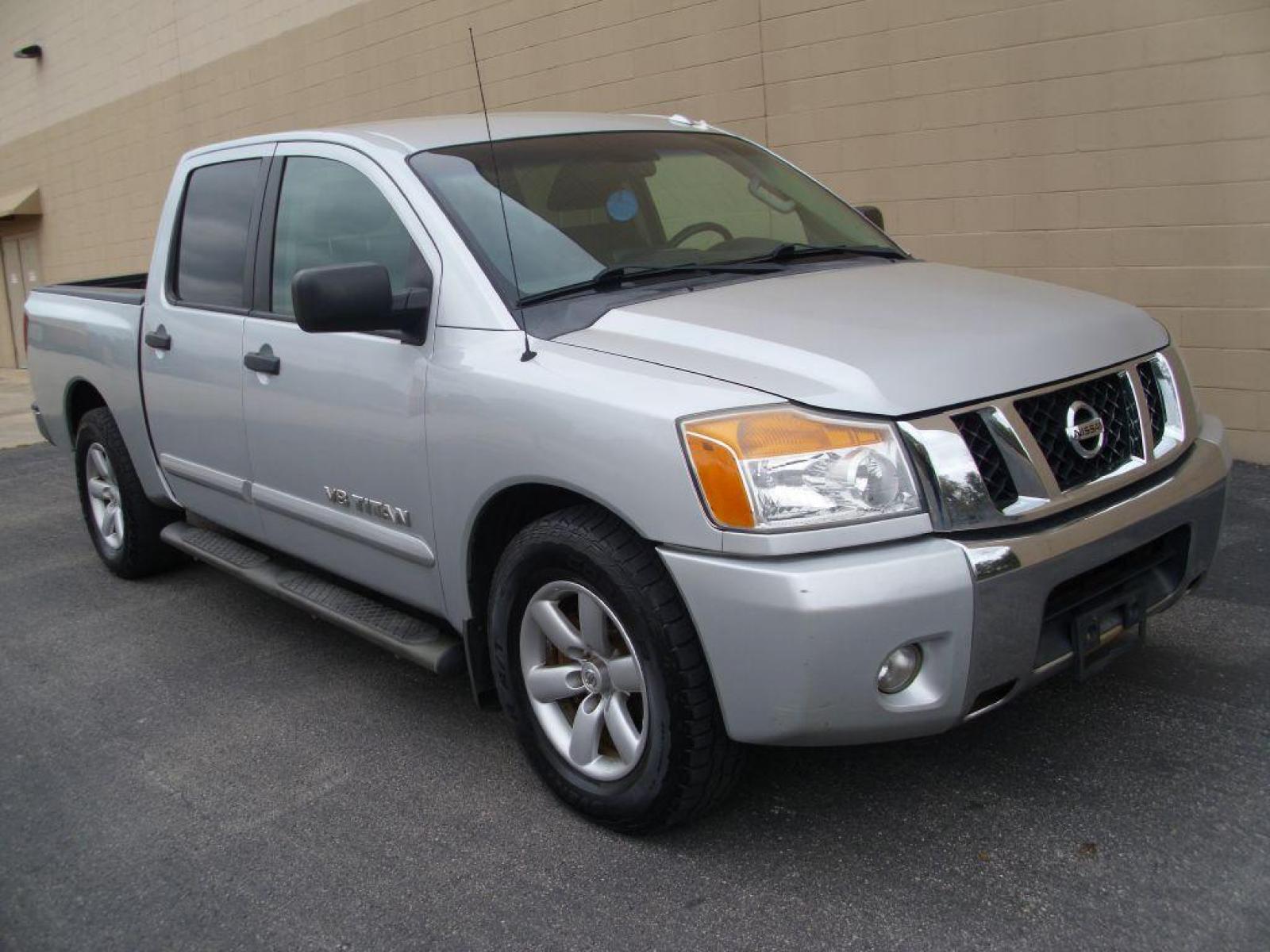 2013 SILVER NISSAN TITAN S (1N6BA0ED2DN) with an 5.6L engine, Automatic transmission, located at 12019 San Pedro Avenue, San Antonio, TX, 78216, (210) 494-5895, 29.551861, -98.487602 - 4 Door; Bed Liner; Bluetooth Technology; Backup Camera; Running Boards; Towing Package; Air Conditioning; Power Windows; Power Locks; Power Steering; Tilt Wheel; AM/FM CD; AM/FM CD/MP3; Satellite; Dual Front Airbags; Passenger Sensor; Active Belts; Crew Cab; Regular Bed; All Wheel ABS; 1/2 Ton; Back - Photo #7