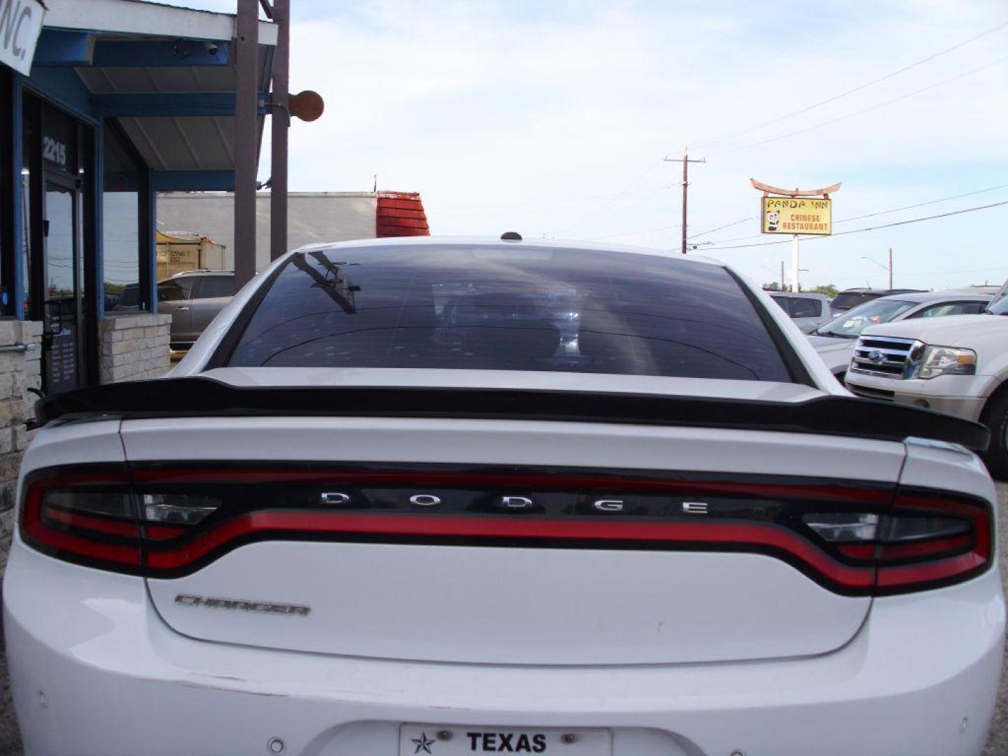 2016 WHITE DODGE CHARGER SE (2C3CDXBG9GH) with an 3.6L engine, Automatic transmission, located at 2215 Harry Wurzbach Rd , San Antonio, TX, 78209, (208) 269-7240, 29.491415, -98.432098 - Photo#8
