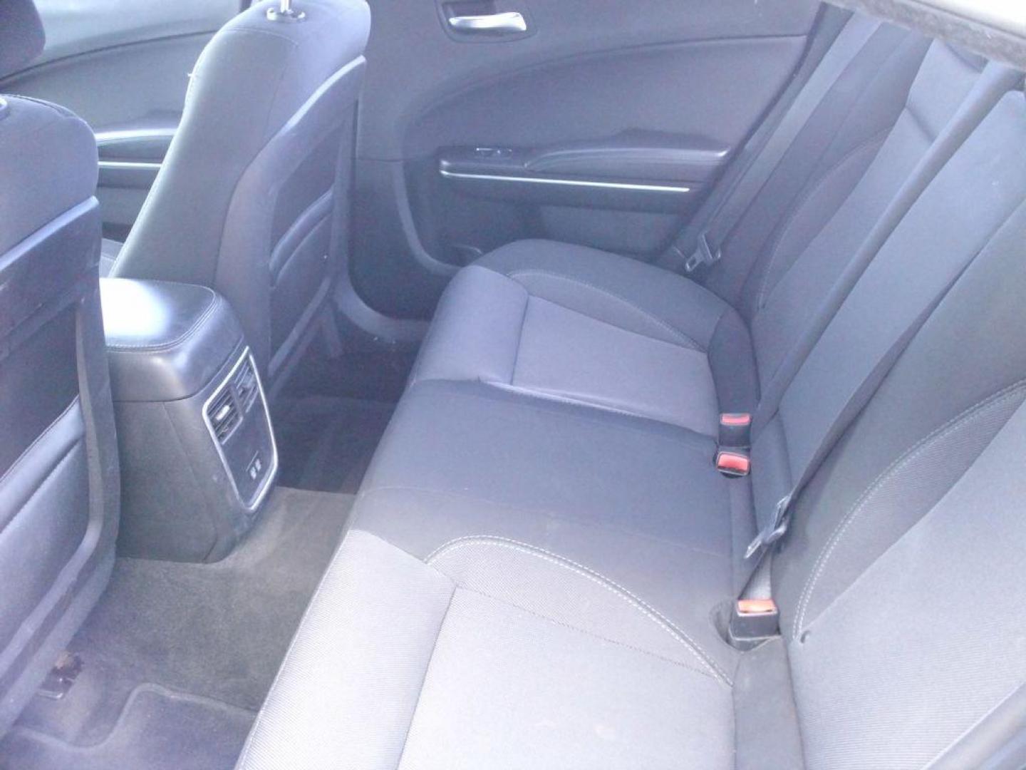2016 WHITE DODGE CHARGER SE (2C3CDXBG9GH) with an 3.6L engine, Automatic transmission, located at 2215 Harry Wurzbach Rd , San Antonio, TX, 78209, (208) 269-7240, 29.491415, -98.432098 - Photo#16