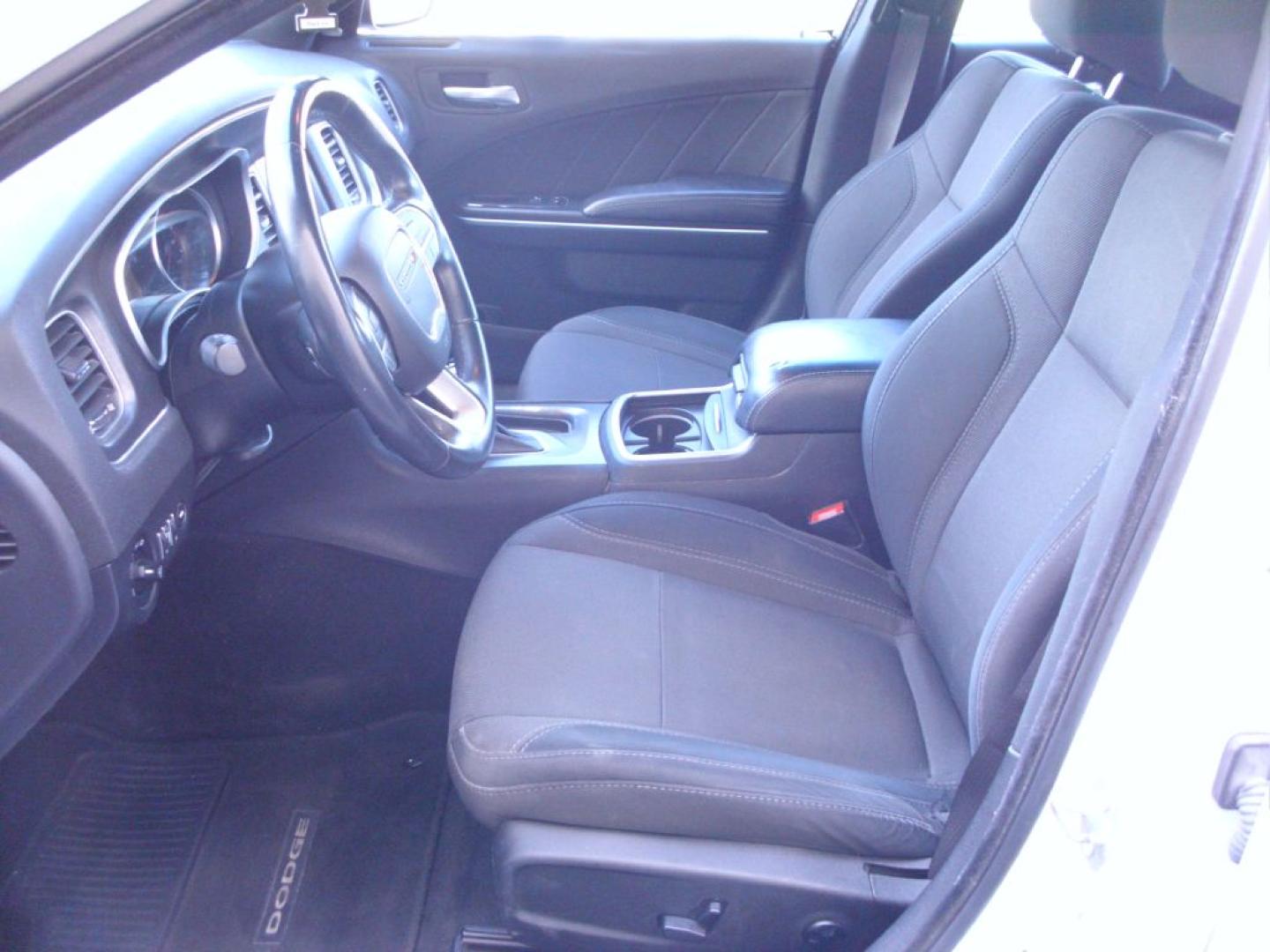 2016 WHITE DODGE CHARGER SE SE (2C3CDXBG9GH) with an 3.6L engine, Automatic transmission, located at 2215 Harry Wurzbach Rd , San Antonio, TX, 78209, (208) 269-7240, 29.491415, -98.432098 - CLEAN VEHICLE- NO ACCIDENTS OR DAMAGES REPORTED! Air Conditioning; Power Windows; Power Locks; Power Steering; Tilt Wheel; AM/FM CD/MP3; Satellite; Sentry Key; Keyless Entry; Alarm; Daytime Running Lights; Dual Front Airbags; Side Airbags; Head Airbags; Rear Head Airbags; Active Seatbelts; All Wheel- Photo#9