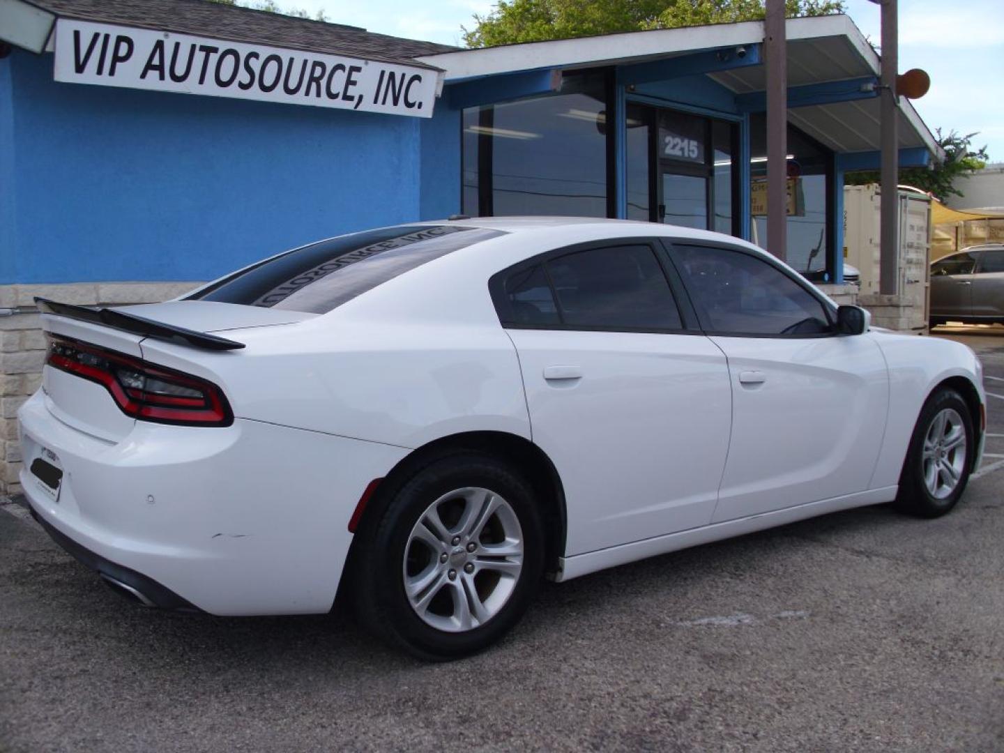 2016 WHITE DODGE CHARGER SE SE (2C3CDXBG9GH) with an 3.6L engine, Automatic transmission, located at 2215 Harry Wurzbach Rd , San Antonio, TX, 78209, (208) 269-7240, 29.491415, -98.432098 - CLEAN VEHICLE- NO ACCIDENTS OR DAMAGES REPORTED! Air Conditioning; Power Windows; Power Locks; Power Steering; Tilt Wheel; AM/FM CD/MP3; Satellite; Sentry Key; Keyless Entry; Alarm; Daytime Running Lights; Dual Front Airbags; Side Airbags; Head Airbags; Rear Head Airbags; Active Seatbelts; All Wheel- Photo#5