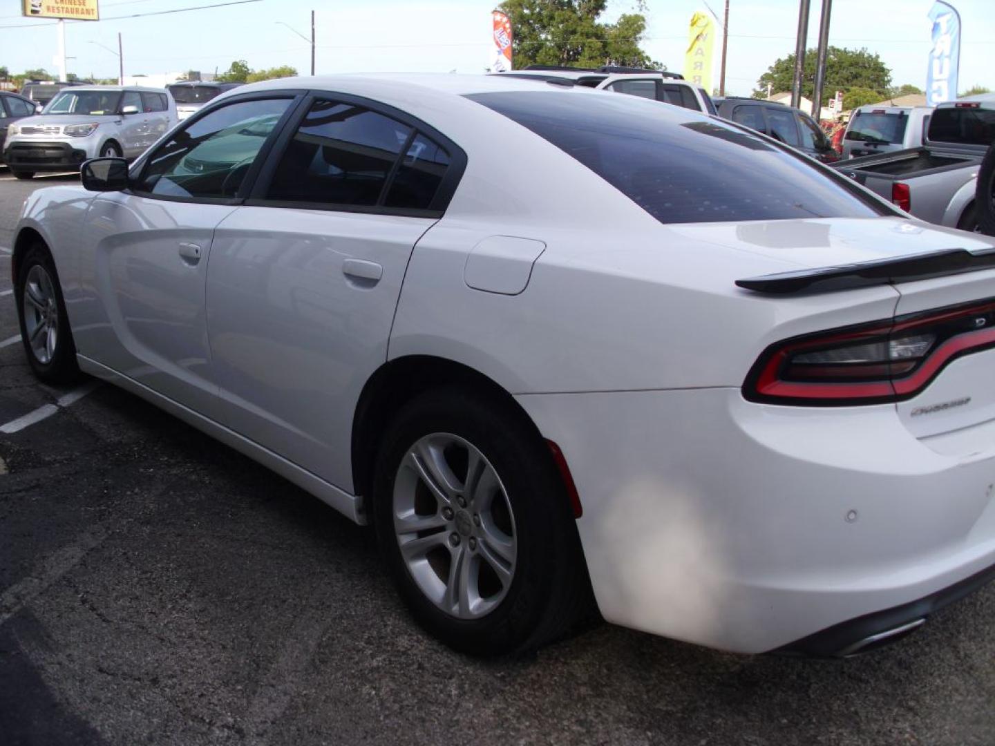 2016 WHITE DODGE CHARGER SE SE (2C3CDXBG9GH) with an 3.6L engine, Automatic transmission, located at 2215 Harry Wurzbach Rd , San Antonio, TX, 78209, (208) 269-7240, 29.491415, -98.432098 - CLEAN VEHICLE- NO ACCIDENTS OR DAMAGES REPORTED! Air Conditioning; Power Windows; Power Locks; Power Steering; Tilt Wheel; AM/FM CD/MP3; Satellite; Sentry Key; Keyless Entry; Alarm; Daytime Running Lights; Dual Front Airbags; Side Airbags; Head Airbags; Rear Head Airbags; Active Seatbelts; All Wheel- Photo#6