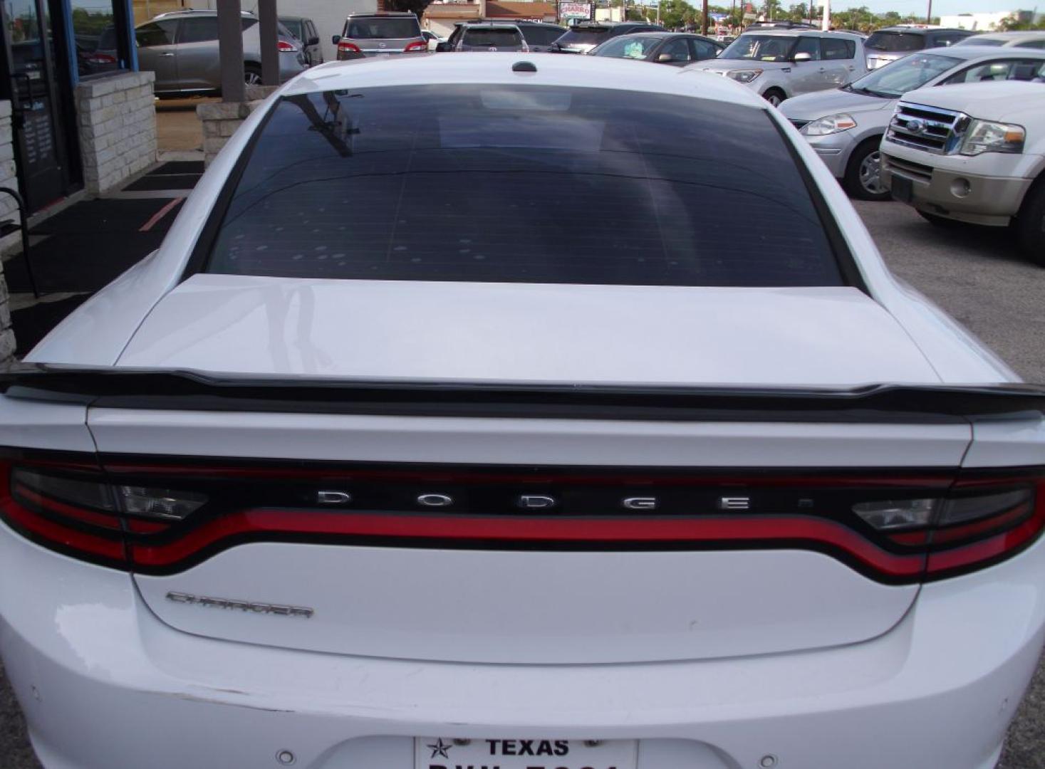2016 WHITE DODGE CHARGER SE SE (2C3CDXBG9GH) with an 3.6L engine, Automatic transmission, located at 2215 Harry Wurzbach Rd , San Antonio, TX, 78209, (208) 269-7240, 29.491415, -98.432098 - CLEAN VEHICLE- NO ACCIDENTS OR DAMAGES REPORTED! Air Conditioning; Power Windows; Power Locks; Power Steering; Tilt Wheel; AM/FM CD/MP3; Satellite; Sentry Key; Keyless Entry; Alarm; Daytime Running Lights; Dual Front Airbags; Side Airbags; Head Airbags; Rear Head Airbags; Active Seatbelts; All Wheel- Photo#7