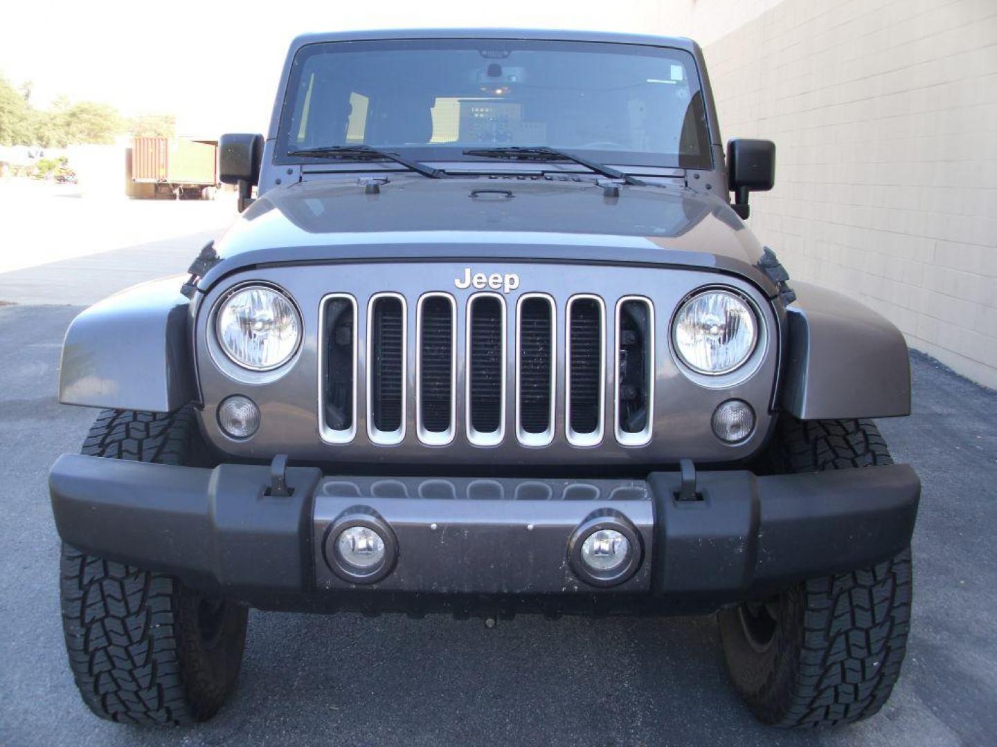 2016 GRAY JEEP WRANGLER UNLIMI SAHARA (1C4BJWEG8GL) with an 3.6L engine, Automatic transmission, located at 12019 San Pedro Avenue, San Antonio, TX, 78216, (210) 494-5895, 29.550915, -98.491142 - We provide financing options through various third-party Credit Unions and Auto Finance Companies, including RBFCU, USAA, SSFCU, Pen Fed, Navy Fed, Credit Human Credit Union of Texas, and most other credit unions. We also work with major banks such as Capital One and Broadway Bank. Payment methods a - Photo#2