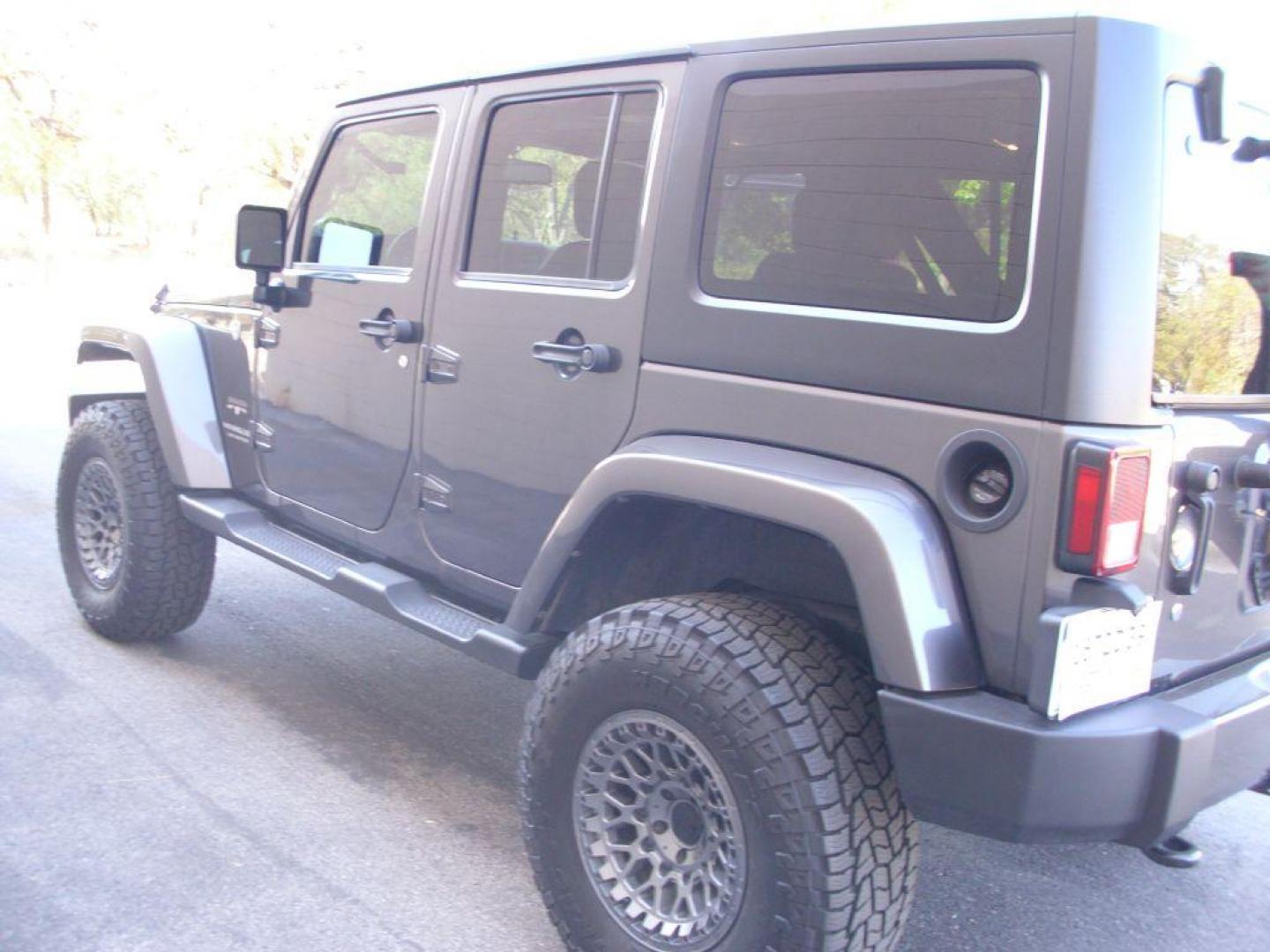 2016 GRAY JEEP WRANGLER UNLIMI SAHARA (1C4BJWEG8GL) with an 3.6L engine, Automatic transmission, located at 12019 San Pedro Avenue, San Antonio, TX, 78216, (210) 494-5895, 29.550915, -98.491142 - We provide financing options through various third-party Credit Unions and Auto Finance Companies, including RBFCU, USAA, SSFCU, Pen Fed, Navy Fed, Credit Human Credit Union of Texas, and most other credit unions. We also work with major banks such as Capital One and Broadway Bank. Payment methods a - Photo#5