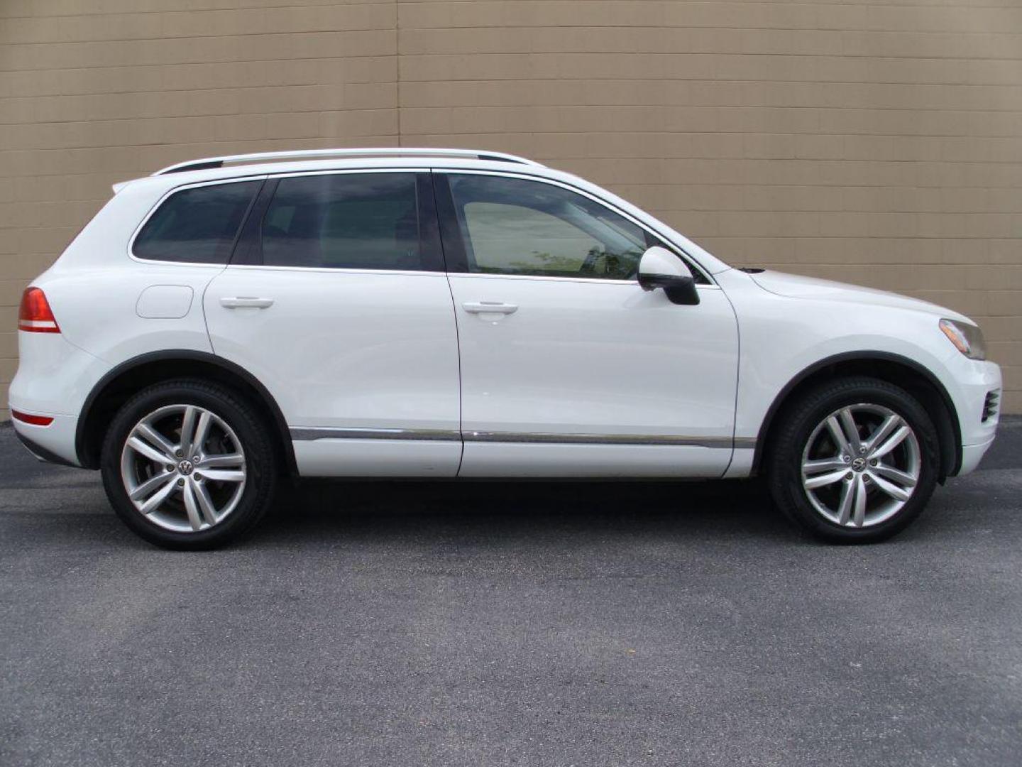 2012 WHITE VOLKSWAGEN TOUAREG V6 (WVGEF9BP8CD) with an 3.6L engine, Automatic transmission, located at 12019 San Pedro Avenue, San Antonio, TX, 78216, (210) 494-5895, 29.550915, -98.491142 - Photo#0