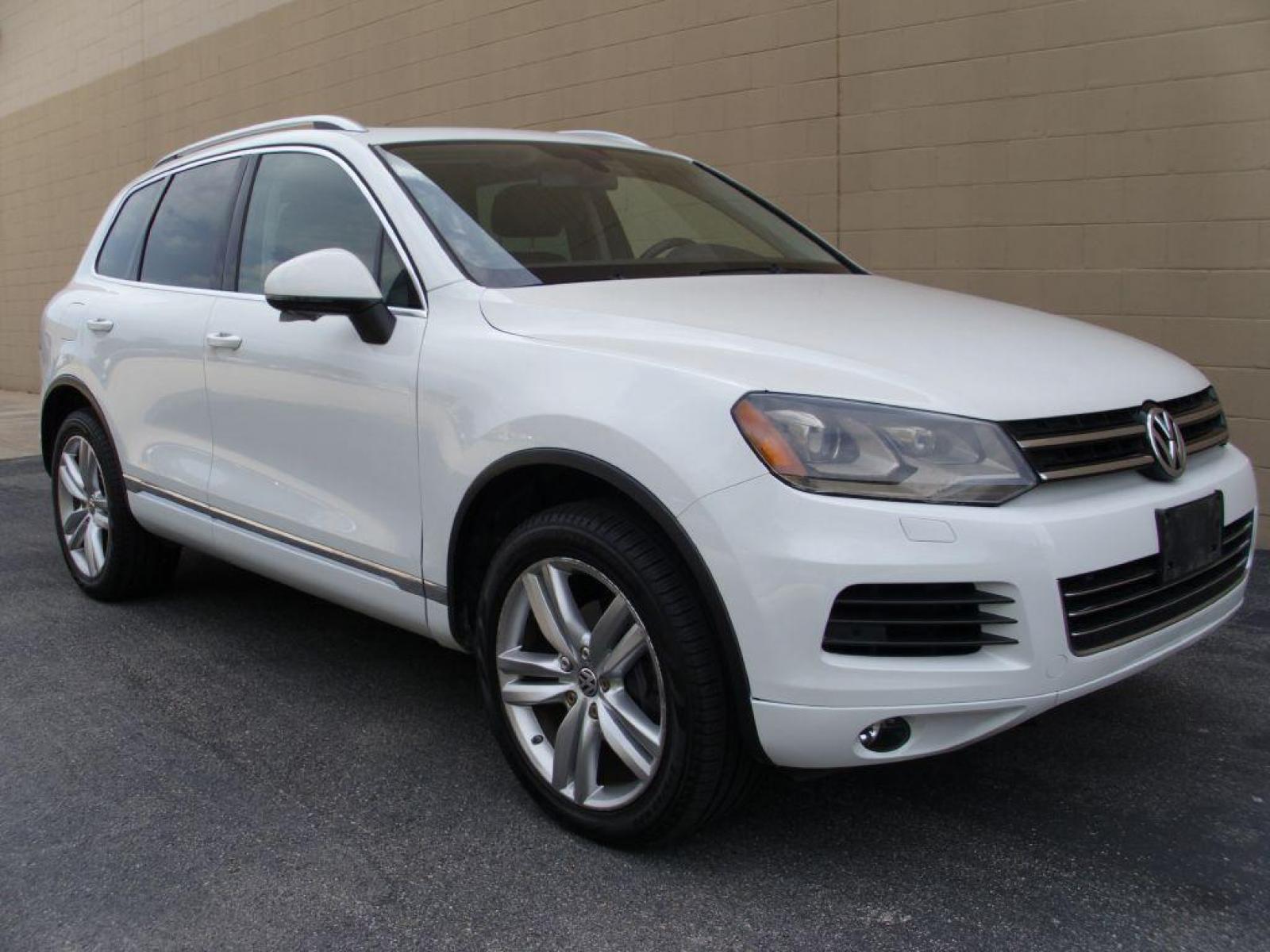 2012 WHITE VOLKSWAGEN TOUAREG V6 (WVGEF9BP8CD) with an 3.6L engine, Automatic transmission, located at 12019 San Pedro Avenue, San Antonio, TX, 78216, (210) 494-5895, 29.551861, -98.487602 - Backup Camera; Bluetooth Technology; Cruise Control; Front Seat Heaters; Leather Seats; Navigation System; Panoramic Sunroof; Power Hatch; Satellite Radio; Tow Hitch; Air Conditioning; Power Windows; Power Locks; Power Steering; Tilt Wheel; AM/FM CD/MP3; Satellite; Immobilizer; Keyless Entry; Alarm; - Photo #2