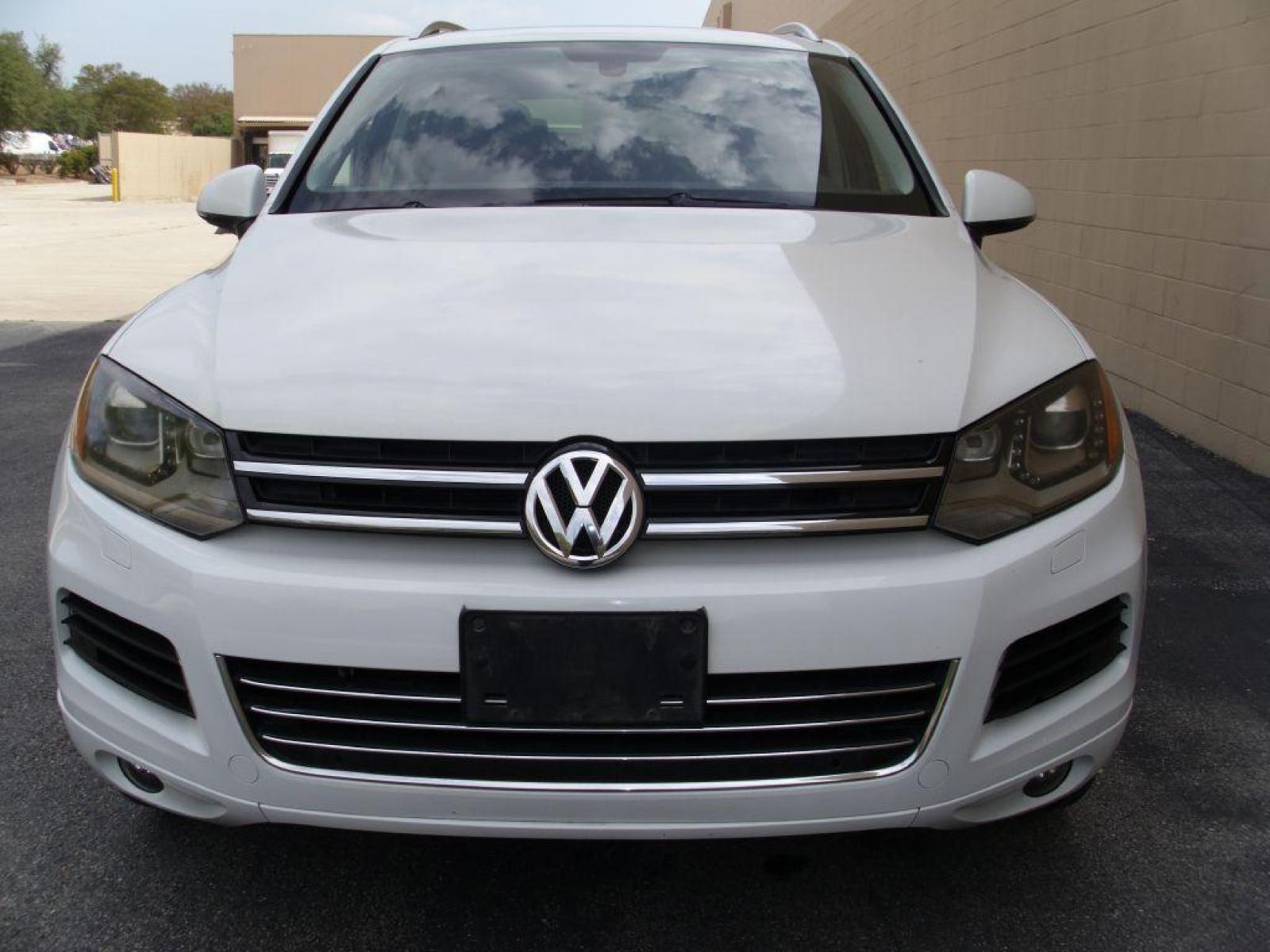 2012 WHITE VOLKSWAGEN TOUAREG V6 (WVGEF9BP8CD) with an 3.6L engine, Automatic transmission, located at 12019 San Pedro Avenue, San Antonio, TX, 78216, (210) 494-5895, 29.550915, -98.491142 - AWD - Backup Camera; Bluetooth Technology; Cruise Control; Front Seat Heaters; Leather Seats; Navigation System; Panoramic Sunroof; Power Hatch; Satellite Radio; Tow Hitch; Air Conditioning; Power Windows; Power Locks; Power Steering; Tilt Wheel; AM/FM CD/MP3; Satellite; Immobilizer; Keyless Entry; - Photo #3