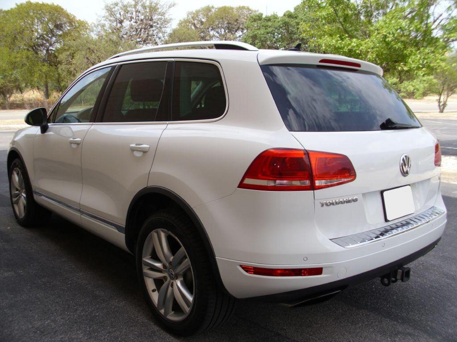 2012 WHITE VOLKSWAGEN TOUAREG V6 (WVGEF9BP8CD) with an 3.6L engine, Automatic transmission, located at 12019 San Pedro Avenue, San Antonio, TX, 78216, (210) 494-5895, 29.550915, -98.491142 - AWD - Backup Camera; Bluetooth Technology; Cruise Control; Front Seat Heaters; Leather Seats; Navigation System; Panoramic Sunroof; Power Hatch; Satellite Radio; Tow Hitch; Air Conditioning; Power Windows; Power Locks; Power Steering; Tilt Wheel; AM/FM CD/MP3; Satellite; Immobilizer; Keyless Entry; - Photo #4