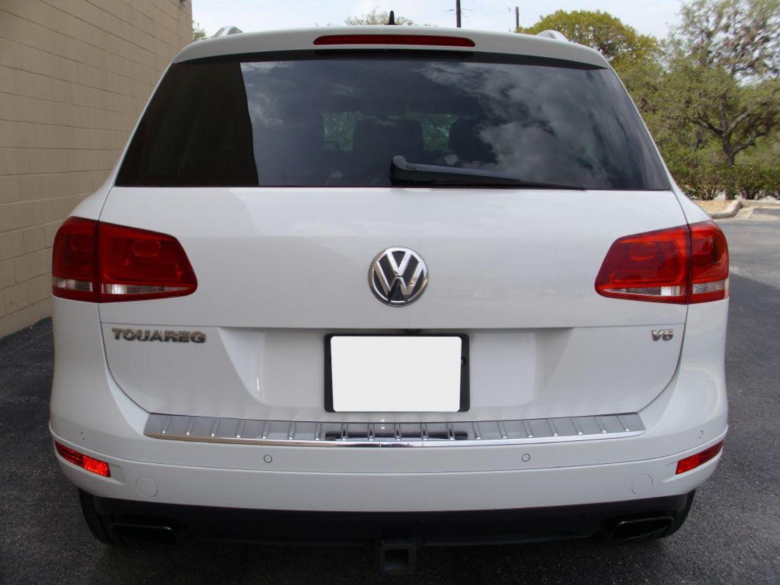 2012 WHITE VOLKSWAGEN TOUAREG V6 (WVGEF9BP8CD) with an 3.6L engine, Automatic transmission, located at 12019 San Pedro Avenue, San Antonio, TX, 78216, (210) 494-5895, 29.550915, -98.491142 - AWD - Backup Camera; Bluetooth Technology; Cruise Control; Front Seat Heaters; Leather Seats; Navigation System; Panoramic Sunroof; Power Hatch; Satellite Radio; Tow Hitch; Air Conditioning; Power Windows; Power Locks; Power Steering; Tilt Wheel; AM/FM CD/MP3; Satellite; Immobilizer; Keyless Entry; - Photo #6