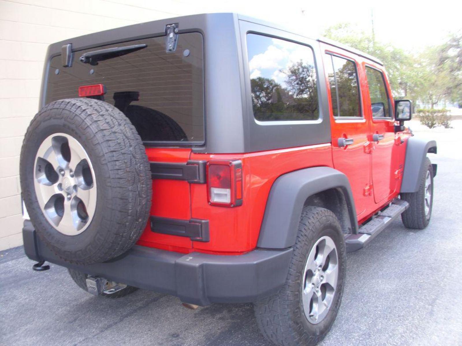 2015 RED JEEP WRANGLER UNLIMI SPORT (1C4BJWDG9FL) with an 3.6L engine, Automatic transmission, located at 12019 San Pedro Avenue, San Antonio, TX, 78216, (210) 494-5895, 29.550915, -98.491142 - Cruise Control; Hard Top; Air Conditioning; Power Steering; Tilt Wheel; AM/FM CD/MP3; Satellite; AM/FM CD/DVD; Sentry Key; Keyless Entry; Alarm; Dual Front Airbags; Passenger Sensor; Active Belts; All Wheel ABS; Retractable Roof Panel - Photo #5