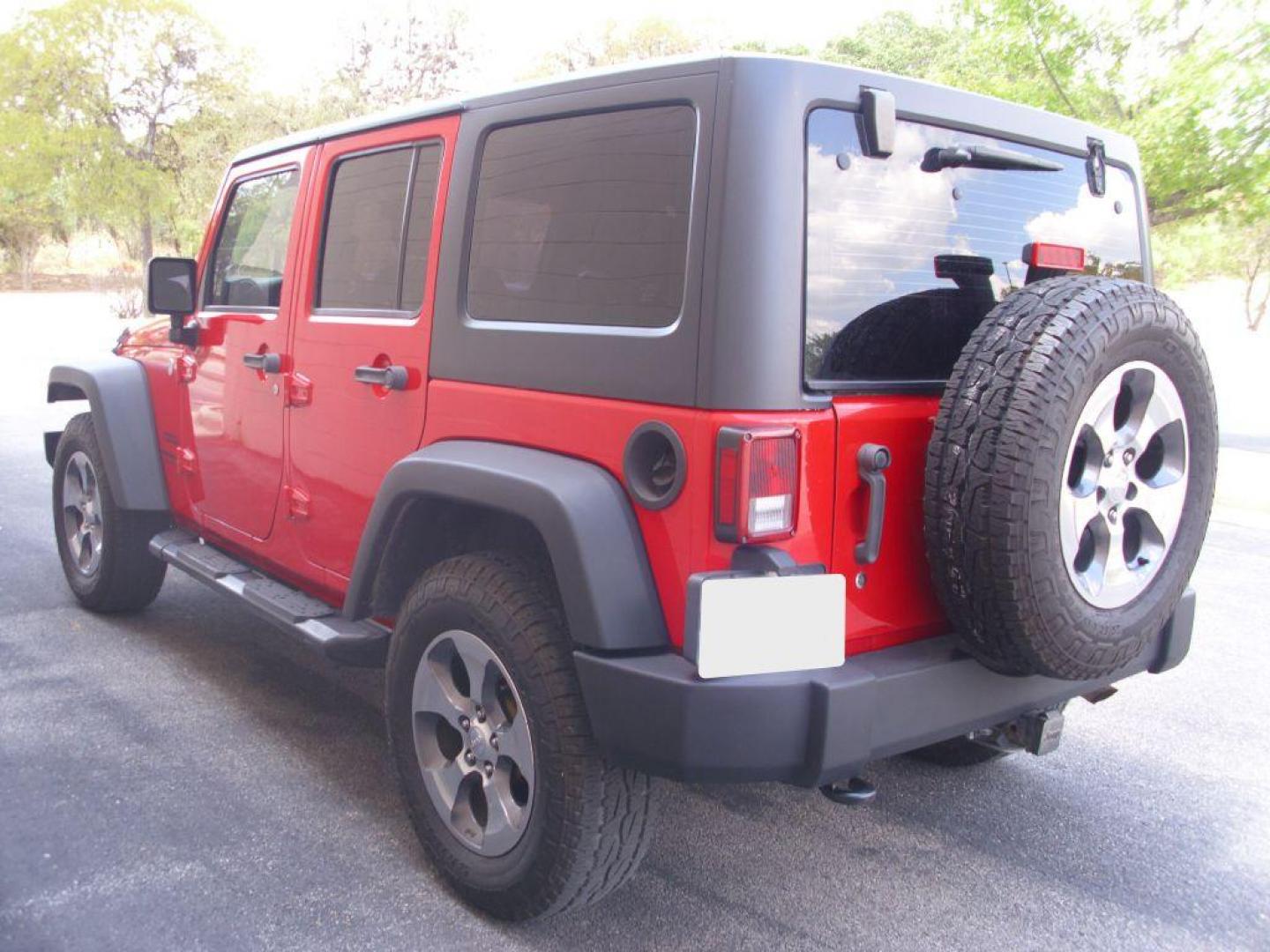 2015 RED JEEP WRANGLER UNLIMI SPORT (1C4BJWDG9FL) with an 3.6L engine, Automatic transmission, located at 12019 San Pedro Avenue, San Antonio, TX, 78216, (210) 494-5895, 29.550915, -98.491142 - We provide financing options through various third-party Credit Unions and Auto Finance Companies, including RBFCU, USAA, SSFCU, Pen Fed, Navy Fed, Credit Human Credit Union of Texas, and most other credit unions. We also work with major banks such as Capital One and Broadway Bank. Payment methods a - Photo#4