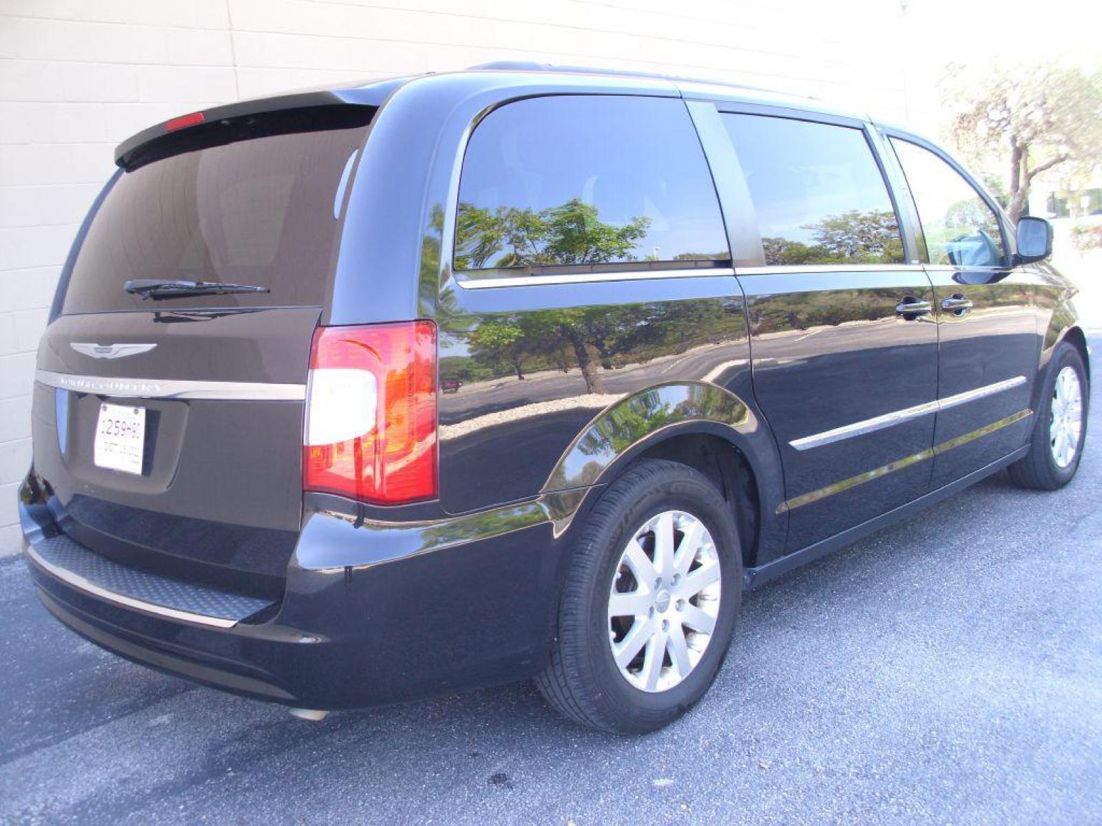 2014 BLACK CHRYSLER TOWN and COUNTRY TOURING (2C4RC1BG6ER) with an 3.6L engine, Automatic transmission, located at 12019 San Pedro Avenue, San Antonio, TX, 78216, (210) 494-5895, 29.551861, -98.487602 - Backup Camera; Leather Seats; Quad Seating; Roof Rack; Power Sliding Doors; Power Liftgate; Bluetooth Technology; Auxiliary Audio Input; DVD Video System; Air Conditioning; Power Windows; Power Locks; Power Steering; Tilt Wheel; AM/FM CD/DVD; Satellite; Sentry Key; Keyless Entry; Alarm; Available; D - Photo #3