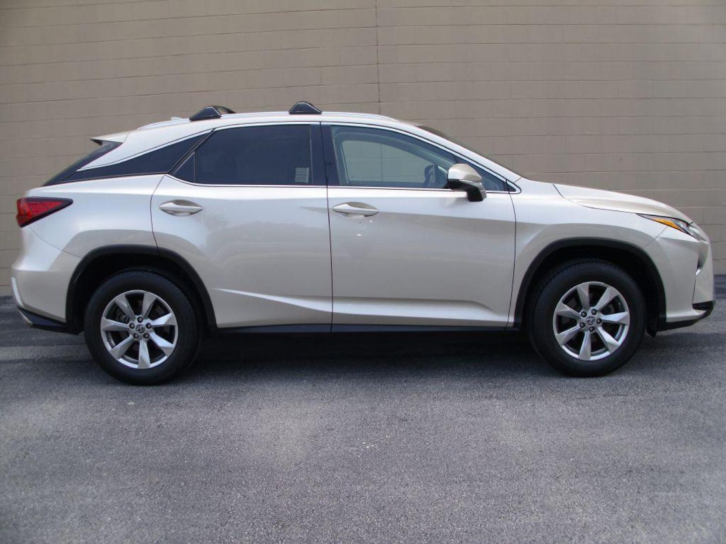 2016 GOLD LEXUS RX 350 (2T2ZZMCA2GC) with an 3.5L engine, Automatic transmission, located at 2215 Harry Wurzbach Rd , San Antonio, TX, 78209, (208) 269-7240, 29.491415, -98.432098 - LEATHER HEATED and COOLED SEATS - SUN ROOF - IMMACULATE!!! Air Conditioning; Power Windows; Power Locks; Power Steering; Tilt Wheel; AM/FM CD/DVD; Satellite; Sentry Key; Keyless Entry; Alarm; Daytime Running Lights; Dual Front Airbags; Side Airbags; Head Airbags; Rear Head Airbags; Active Seatbel - Photo#0