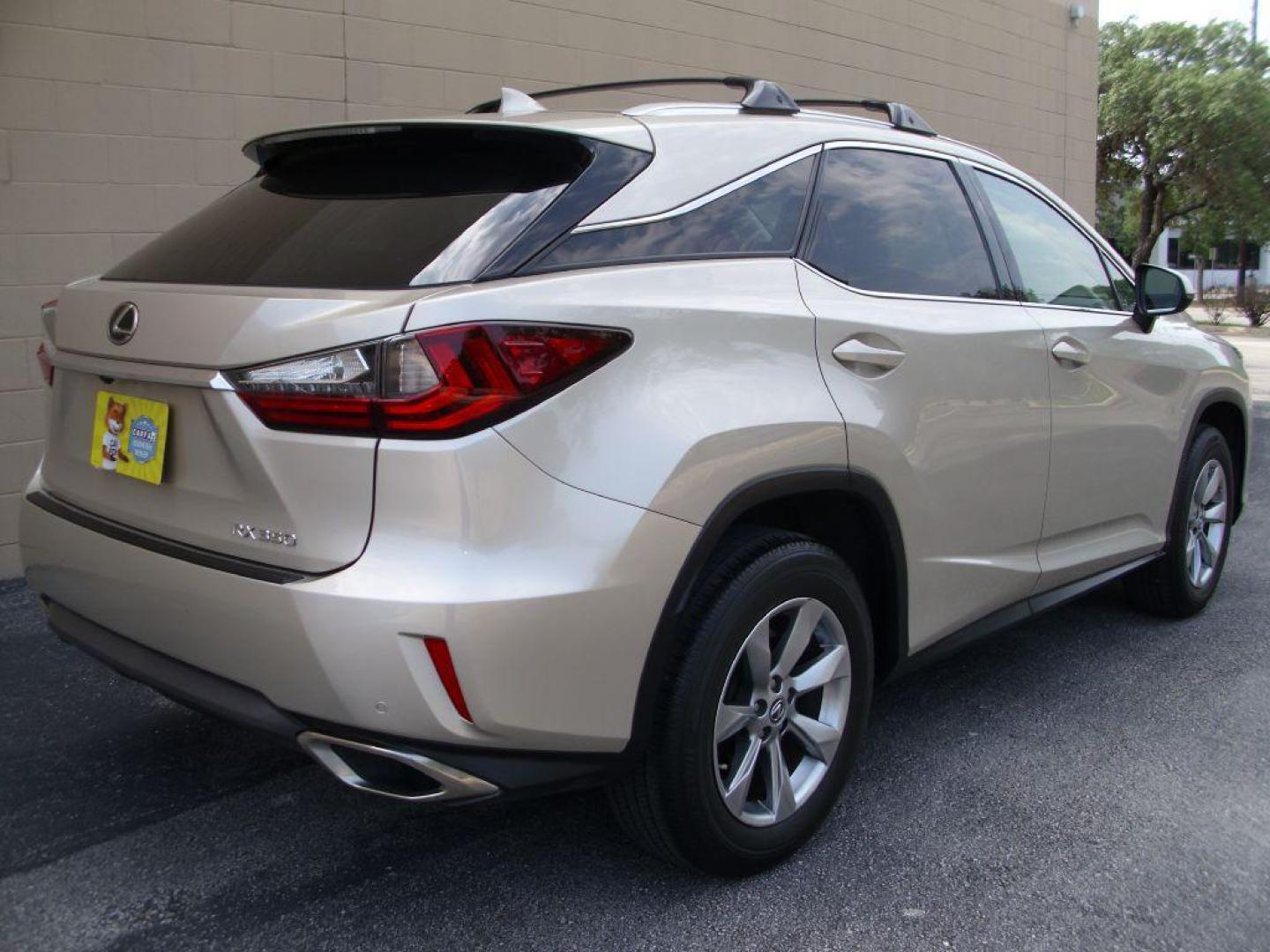 2016 GOLD LEXUS RX 350 (2T2ZZMCA2GC) with an 3.5L engine, Automatic transmission, located at 2215 Harry Wurzbach Rd , San Antonio, TX, 78209, (208) 269-7240, 29.491415, -98.432098 - LEATHER HEATED and COOLED SEATS - SUN ROOF - IMMACULATE!!! Air Conditioning; Power Windows; Power Locks; Power Steering; Tilt Wheel; AM/FM CD/DVD; Satellite; Sentry Key; Keyless Entry; Alarm; Daytime Running Lights; Dual Front Airbags; Side Airbags; Head Airbags; Rear Head Airbags; Active Seatbel - Photo#4