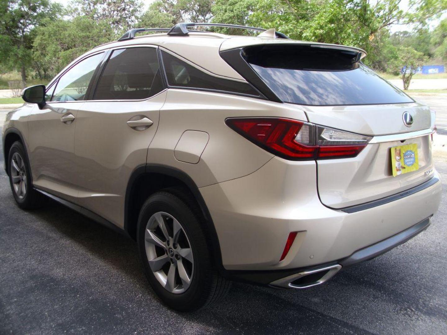 2016 GOLD LEXUS RX 350 (2T2ZZMCA2GC) with an 3.5L engine, Automatic transmission, located at 2215 Harry Wurzbach Rd , San Antonio, TX, 78209, (208) 269-7240, 29.491415, -98.432098 - LEATHER HEATED and COOLED SEATS - SUN ROOF - IMMACULATE!!! Air Conditioning; Power Windows; Power Locks; Power Steering; Tilt Wheel; AM/FM CD/DVD; Satellite; Sentry Key; Keyless Entry; Alarm; Daytime Running Lights; Dual Front Airbags; Side Airbags; Head Airbags; Rear Head Airbags; Active Seatbel - Photo#5