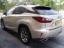 2016 GOLD LEXUS RX 350 (2T2ZZMCA2GC) with an 3.5L engine, Automatic transmission, located at 2215 Harry Wurzbach Rd , San Antonio, TX, 78209, (208) 269-7240, 29.491415, -98.432098 - LEATHER HEATED and COOLED SEATS - SUN ROOF - IMMACULATE!!! Air Conditioning; Power Windows; Power Locks; Power Steering; Tilt Wheel; AM/FM CD/DVD; Satellite; Sentry Key; Keyless Entry; Alarm; Daytime Running Lights; Dual Front Airbags; Side Airbags; Head Airbags; Rear Head Airbags; Active Seatbel - Photo#5