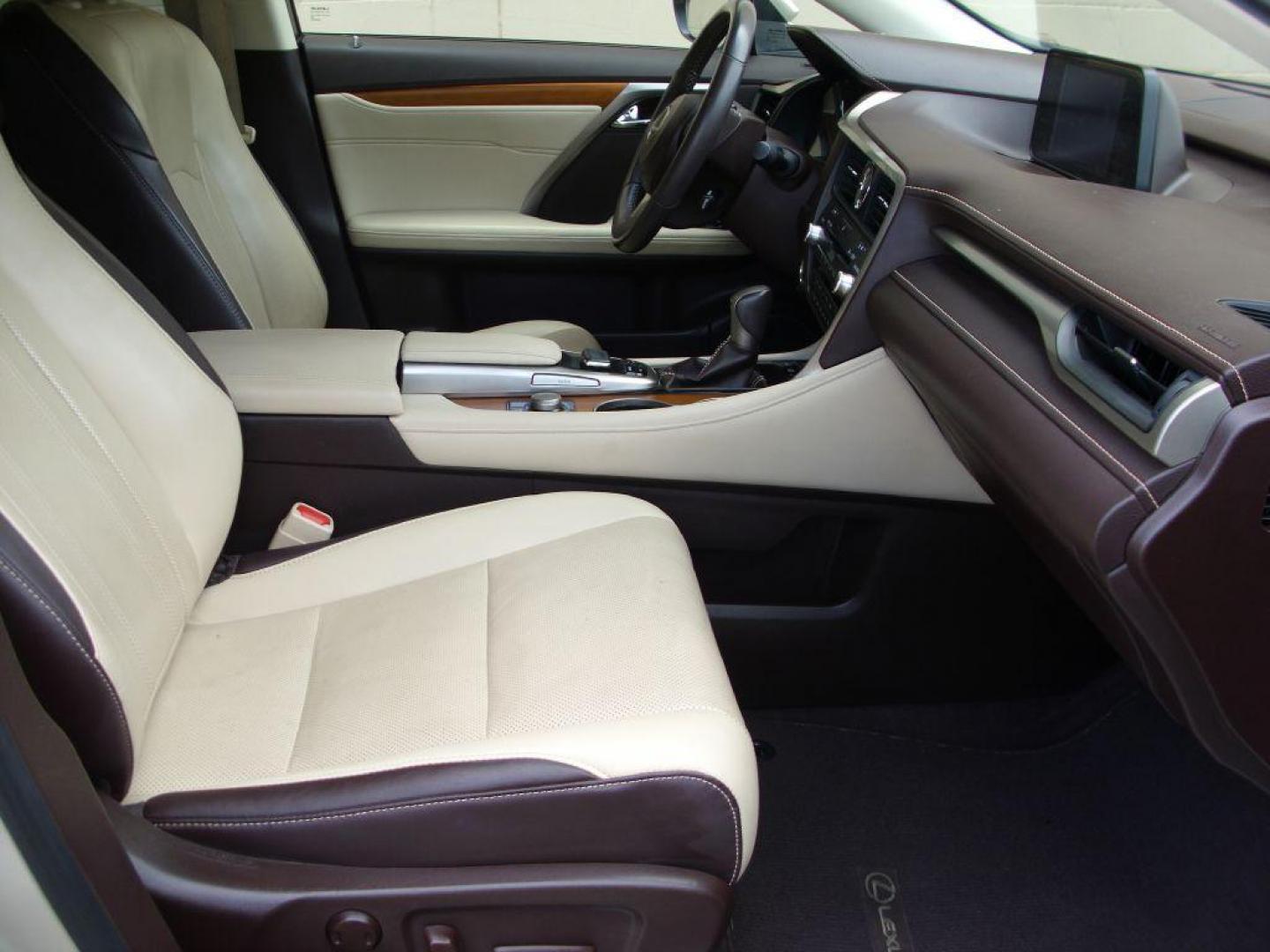 2016 GOLD LEXUS RX 350 (2T2ZZMCA2GC) with an 3.5L engine, Automatic transmission, located at 2215 Harry Wurzbach Rd , San Antonio, TX, 78209, (208) 269-7240, 29.491415, -98.432098 - LEATHER HEATED and COOLED SEATS - SUN ROOF - IMMACULATE!!! Air Conditioning; Power Windows; Power Locks; Power Steering; Tilt Wheel; AM/FM CD/DVD; Satellite; Sentry Key; Keyless Entry; Alarm; Daytime Running Lights; Dual Front Airbags; Side Airbags; Head Airbags; Rear Head Airbags; Active Seatbel - Photo#11