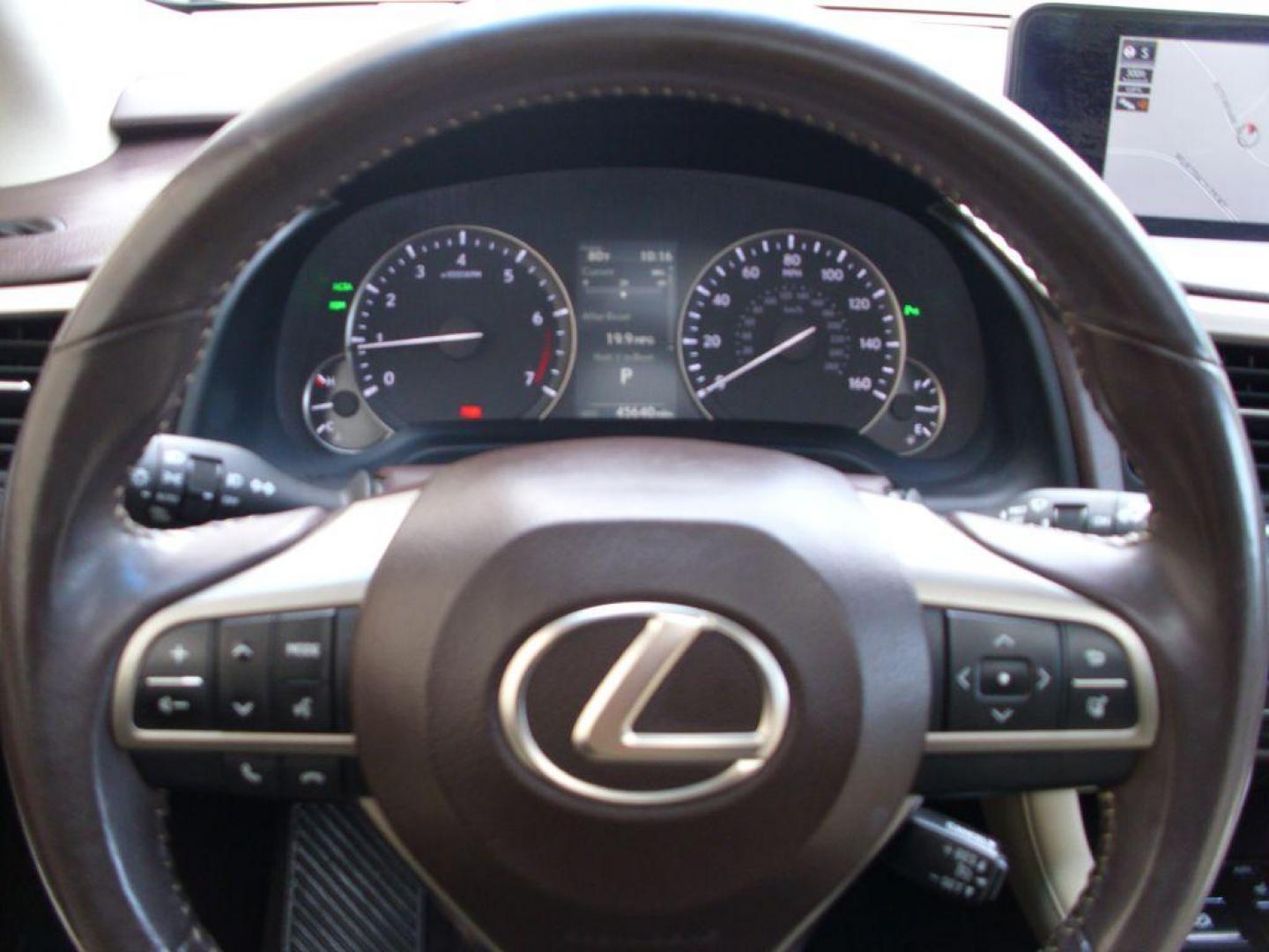 2016 GOLD LEXUS RX 350 (2T2ZZMCA2GC) with an 3.5L engine, Automatic transmission, located at 2215 Harry Wurzbach Rd , San Antonio, TX, 78209, (208) 269-7240, 29.491415, -98.432098 - LEATHER HEATED and COOLED SEATS - SUN ROOF - IMMACULATE!!! Air Conditioning; Power Windows; Power Locks; Power Steering; Tilt Wheel; AM/FM CD/DVD; Satellite; Sentry Key; Keyless Entry; Alarm; Daytime Running Lights; Dual Front Airbags; Side Airbags; Head Airbags; Rear Head Airbags; Active Seatbel - Photo#20