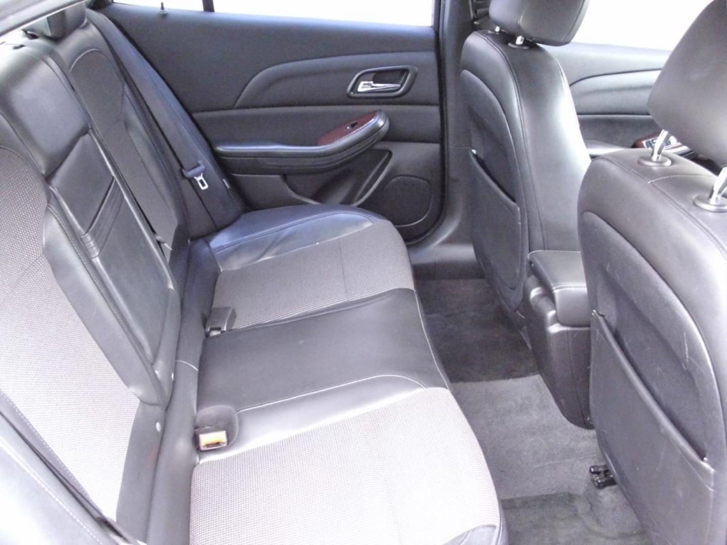 2013 BLACK CHEVROLET MALIBU LT (1G11C5SA1DU) with an 2.5L engine, Automatic transmission, located at 2215 Harry Wurzbach Rd , San Antonio, TX, 78209, (208) 269-7240, 29.491415, -98.432098- Photo#9