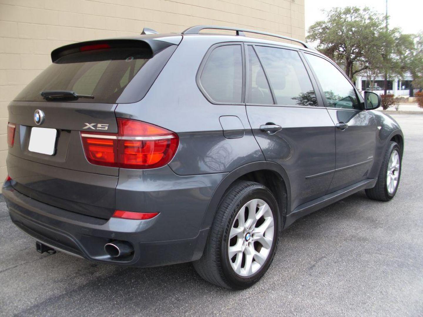 2013 GRAY BMW X5 XDRIVE35I (5UXZV4C56D0) with an 3.0L engine, Automatic transmission, located at 12019 San Pedro Avenue, San Antonio, TX, 78216, (210) 494-5895, 29.550915, -98.491142 - Auxiliary Audio Input; Bluetooth Technology; Backup Camera; Cruise Control; Front Seat Heaters; Head Up Display; Leather Seats; Panoramic Sunroof; Parking Sensors; Rear Sunshade; Smart Key; Tow Hitch; Air Conditioning; Power Hatch; Power Windows; Power Locks; Power Steering; Tilt Wheel; AM/FM CD/MP3 - Photo#5