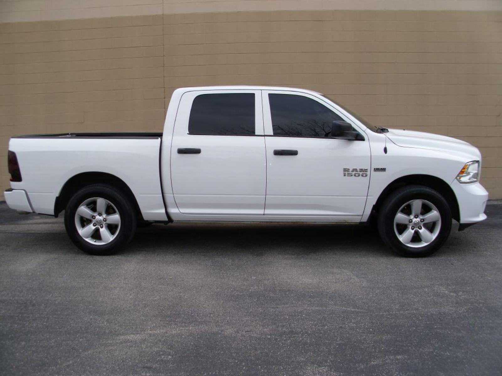 2016 WHITE RAM 1500 CREW CAB ST (3C6RR6KT7GG) with an 5.7L engine, Automatic transmission, located at 12019 San Pedro Avenue, San Antonio, TX, 78216, (210) 494-5895, 29.551861, -98.487602 - Auxiliary Input; Bed Liner; Bluetooth Technology; Cruise Control; Satellite Radio; Tow Hitch; Air Conditioning; Available; Power Steering; Tilt Wheel; AM/FM CD/MP3; Satellite; Passive sentry key; Available; Dual Air Bags Front and Sides; Active Belts; Crew Cab; Short Bed; All Wheel ABS; 1/2 Ton W - Photo #0