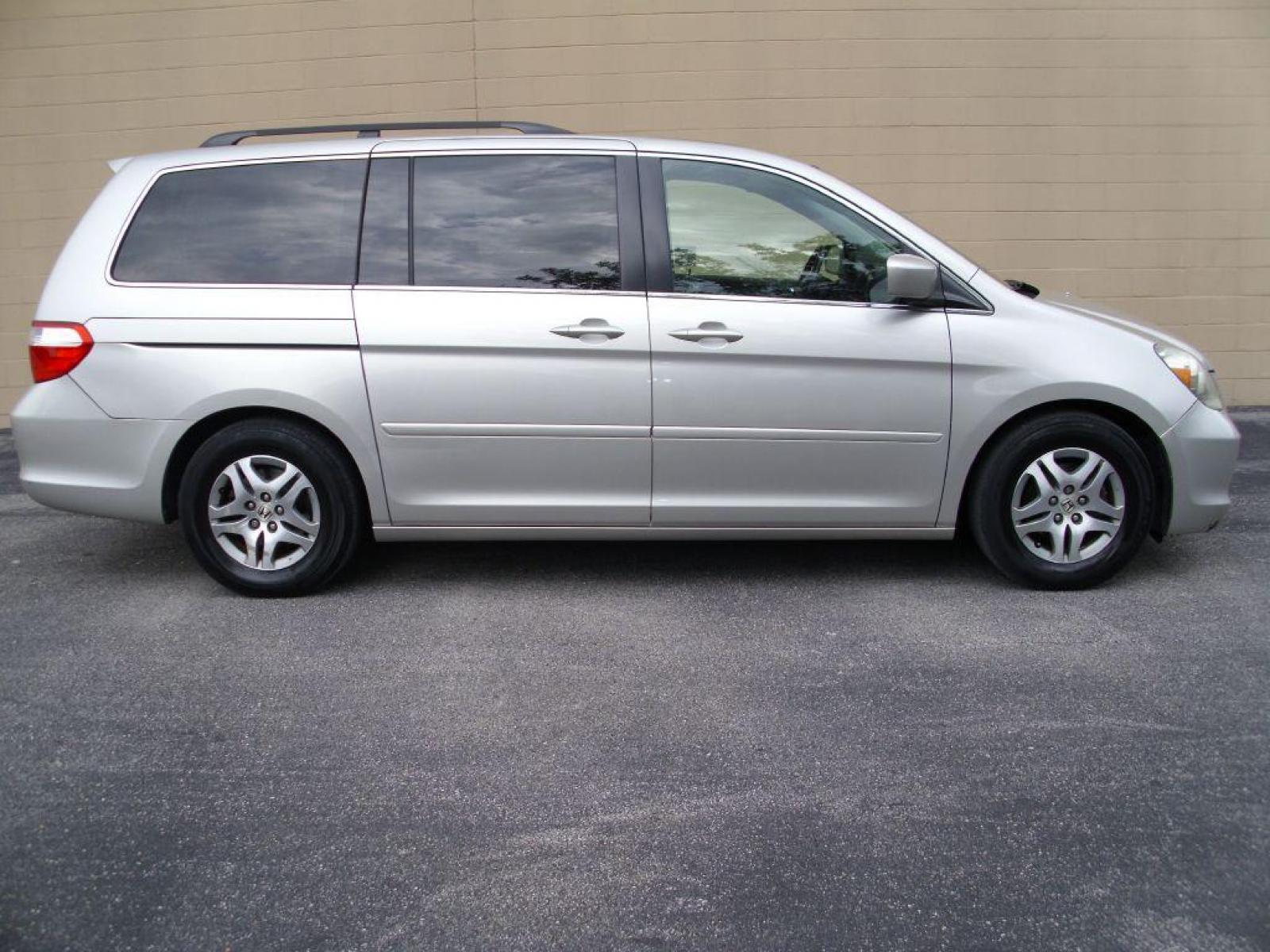2006 SILVER HONDA ODYSSEY EXL (5FNRL38696B) with an 3.5L engine, Automatic transmission, located at 12019 San Pedro Avenue, San Antonio, TX, 78216, (210) 494-5895, 29.551861, -98.487602 - Cruise Control; Fold-Away Third Row; Leather Seats; Front Seat Heaters; Power Seats; Power Sliding Doors; 7 Passenger; Quad Seats; Sunroof; Air Conditioning; Power Windows; Power Locks; Power Steering; Tilt Wheel; AM/FM CD; Satellite; Immobilizer; Dual Air Bags Front and Sides; Active Belts; Crew Ca - Photo #0