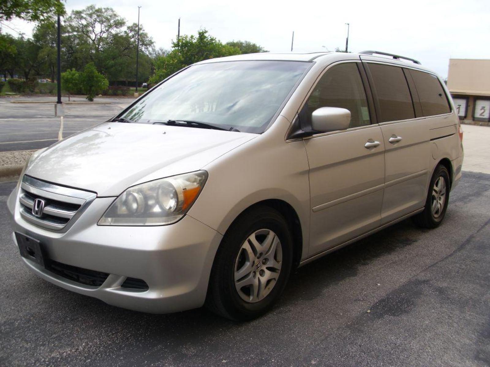 2006 SILVER HONDA ODYSSEY EXL (5FNRL38696B) with an 3.5L engine, Automatic transmission, located at 12019 San Pedro Avenue, San Antonio, TX, 78216, (210) 494-5895, 29.551861, -98.487602 - Cruise Control; Fold-Away Third Row; Leather Seats; Front Seat Heaters; Power Seats; Power Sliding Doors; 7 Passenger; Quad Seats; Sunroof; Air Conditioning; Power Windows; Power Locks; Power Steering; Tilt Wheel; AM/FM CD; Satellite; Immobilizer; Dual Air Bags Front and Sides; Active Belts; Crew Ca - Photo #1