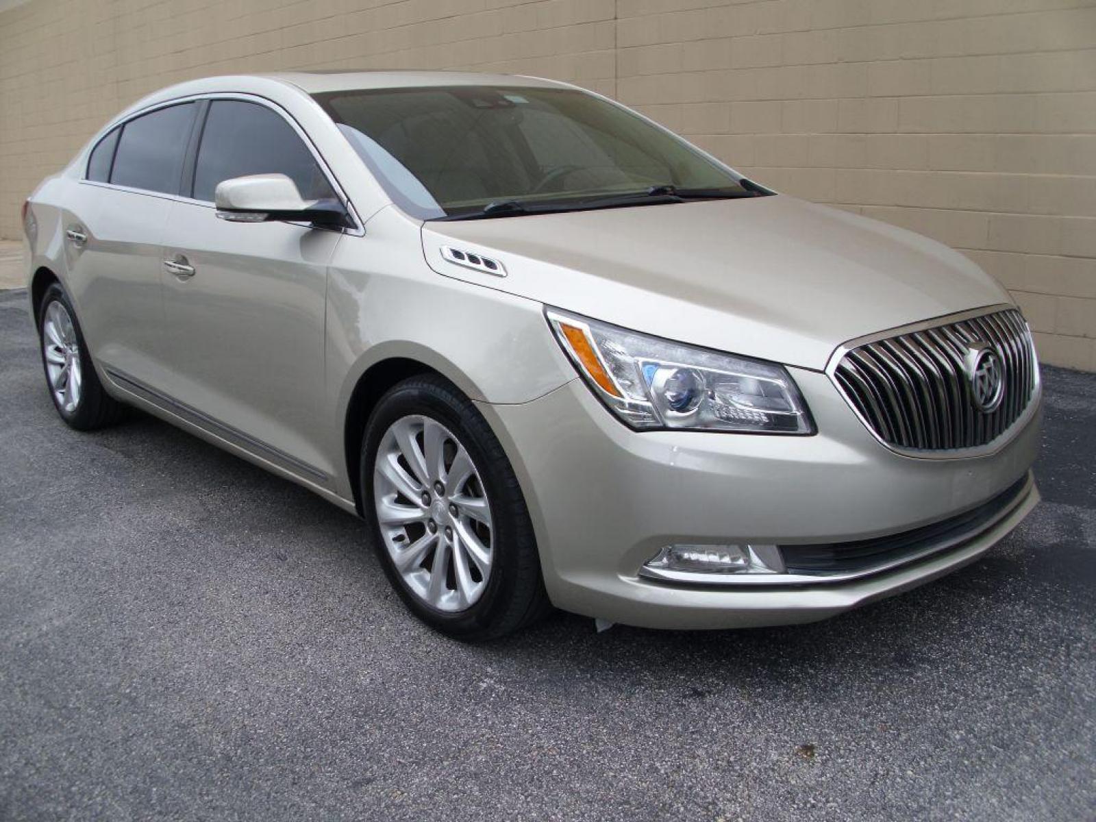 2015 GOLD BUICK LACROSSE LEATHER (1G4GB5G35FF) with an 3.6L engine, Automatic transmission, located at 12019 San Pedro Avenue, San Antonio, TX, 78216, (210) 494-5895, 29.550915, -98.491142 - IMMACULATE!!! Air Conditioning; Power Windows; Power Locks; Power Steering; Tilt Wheel; AM/FM CD/MP3; Satellite; AM/FM CD/DVD; Sentry Key; Keyless Entry; Alarm; Daytime Running Lights; Dual Airbags Front Head and Side; Active Seatbelts; Passenger Airbag Sensor; Dual Rear Side Airbag; All Wheel ABS; - Photo #1