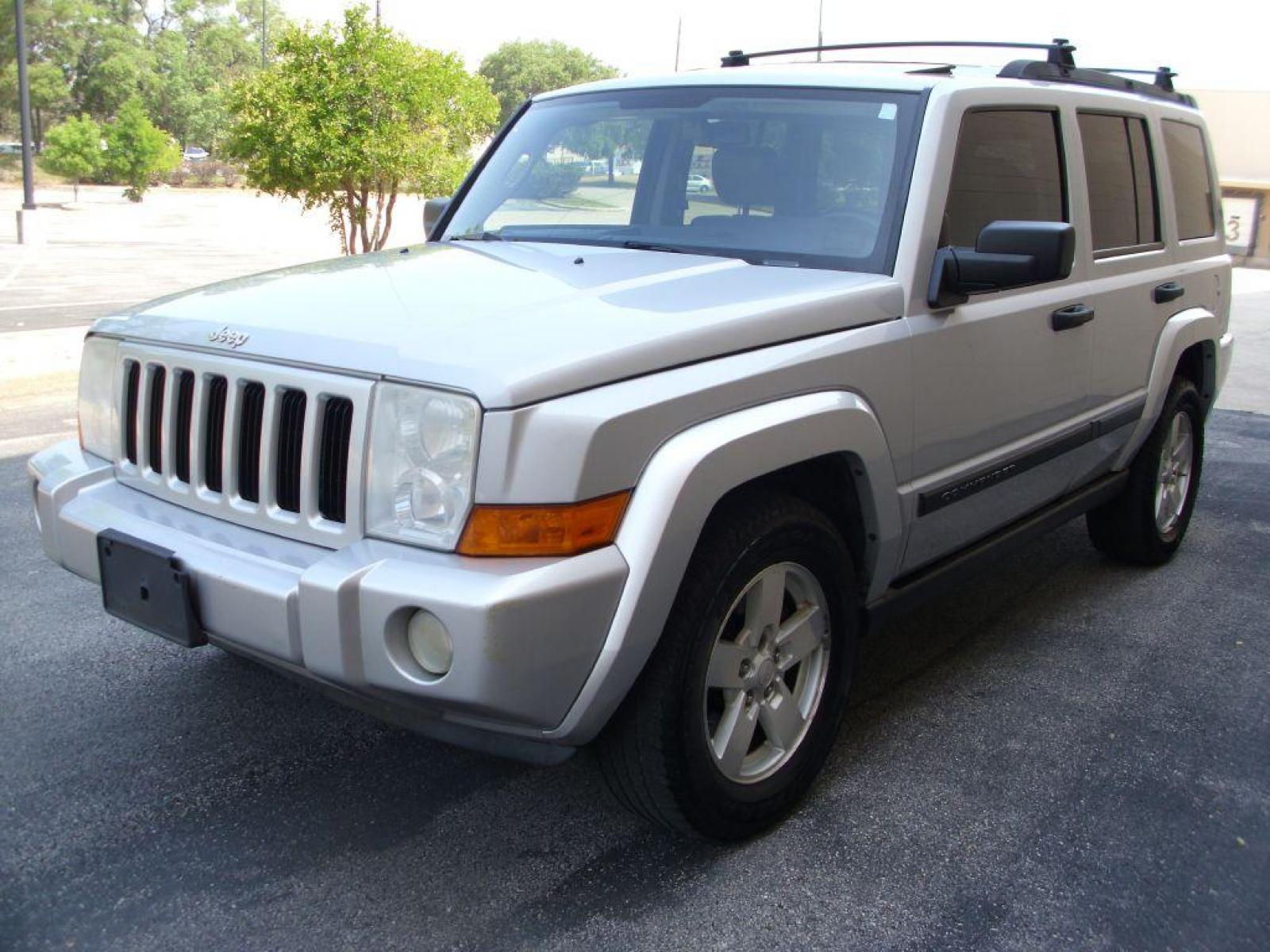 2006 SILVER JEEP COMMANDER BASE (1J8HG48K46C) with an 3.7L engine, Automatic transmission, located at 12019 San Pedro Avenue, San Antonio, TX, 78216, (210) 494-5895, 29.550915, -98.491142 - VERY CLEAN - AMAZING - 3RD ROW - 4WD/AWD; ABS Brakes; AM/FM Stereo; Air Conditioning; Alloy Wheels; Automatic Transmission; CD Audio; Cruise Control; Fold-Away Third Row; Full Roof Rack; Leather Seats; Overhead Airbags; Parking Sensors; Power Locks; Power Mirrors; Power Seat(s); Side Airbags; Sunro - Photo #1
