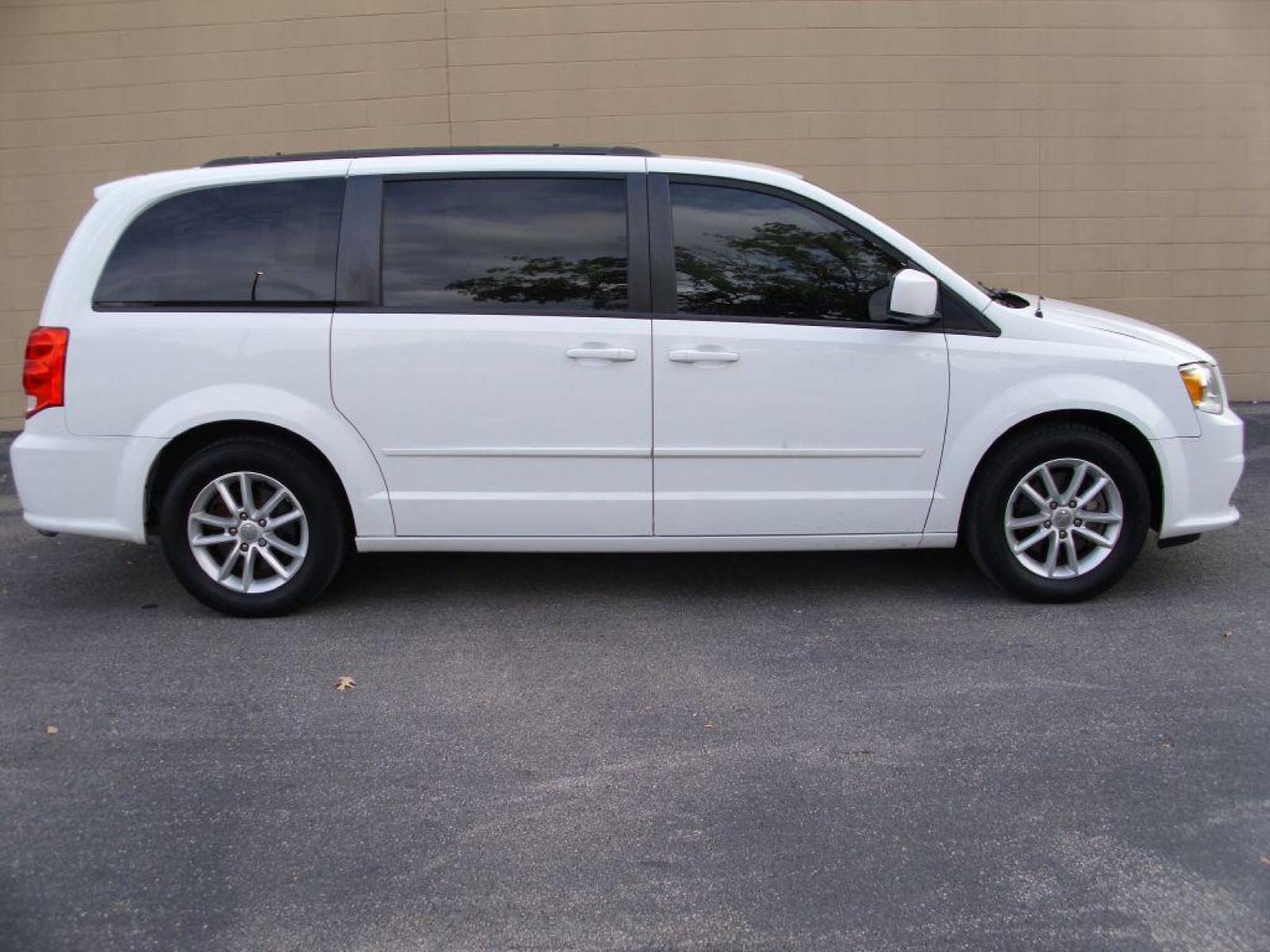 2015 WHITE DODGE GRAND CARAVAN SXT (2C4RDGCG2FR) with an 3.6L engine, Automatic transmission, located at 12019 San Pedro Avenue, San Antonio, TX, 78216, (210) 494-5895, 29.550915, -98.491142 - IMMACULATE!!!! Air Conditioning; Power Hatch/Deck; Power Windows; Power Locks; Power Steering; Tilt Wheel; AM/FM CD/MP3; Satellite; AM/FM CD/DVD; Sentry Key; Keyless Entry; Alarm; Dual Front Airbags; Side Airbags; Head Airbags; Rear Head Airbags; Active Seatbelts; All Wheel ABS; Alloy Wheels; Auxil - Photo #0